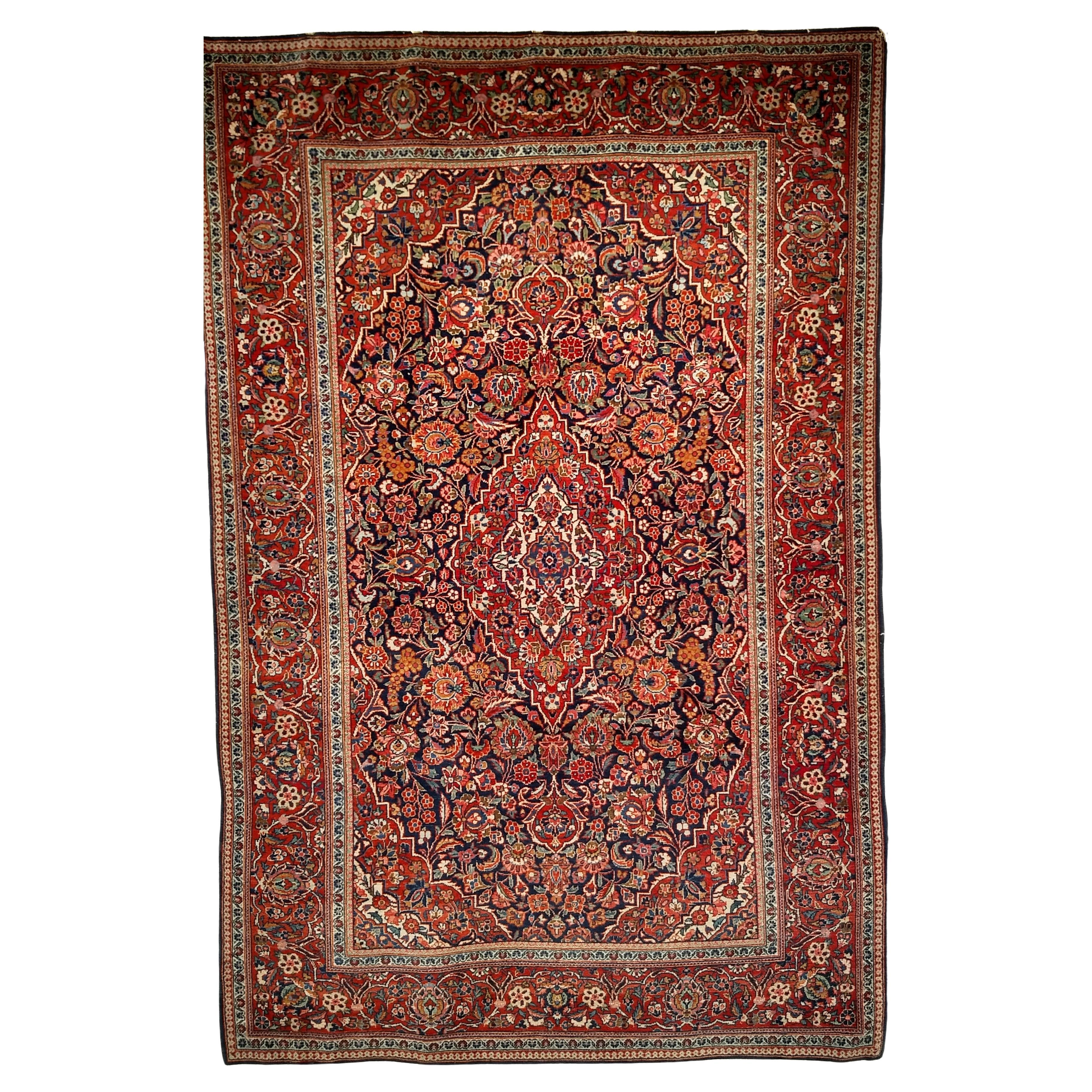 Persischer Kashan-Teppich des frühen 20. Jahrhunderts mit floralem Design in Marine, Rot und Blau