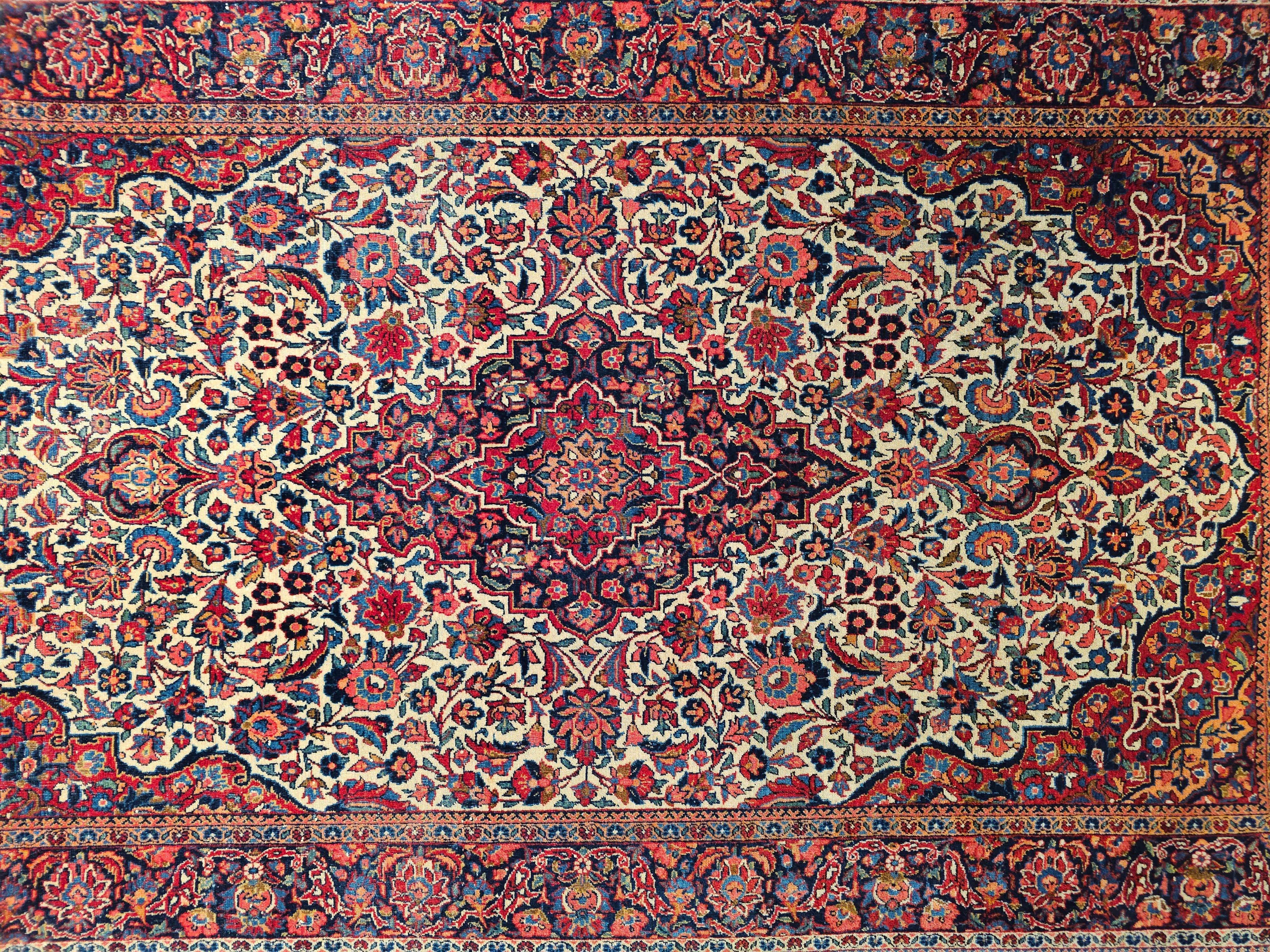 Hand-Knotted Early 20th Century Persian Kashan in Floral Design in Ivory, Navy Blue, Red For Sale