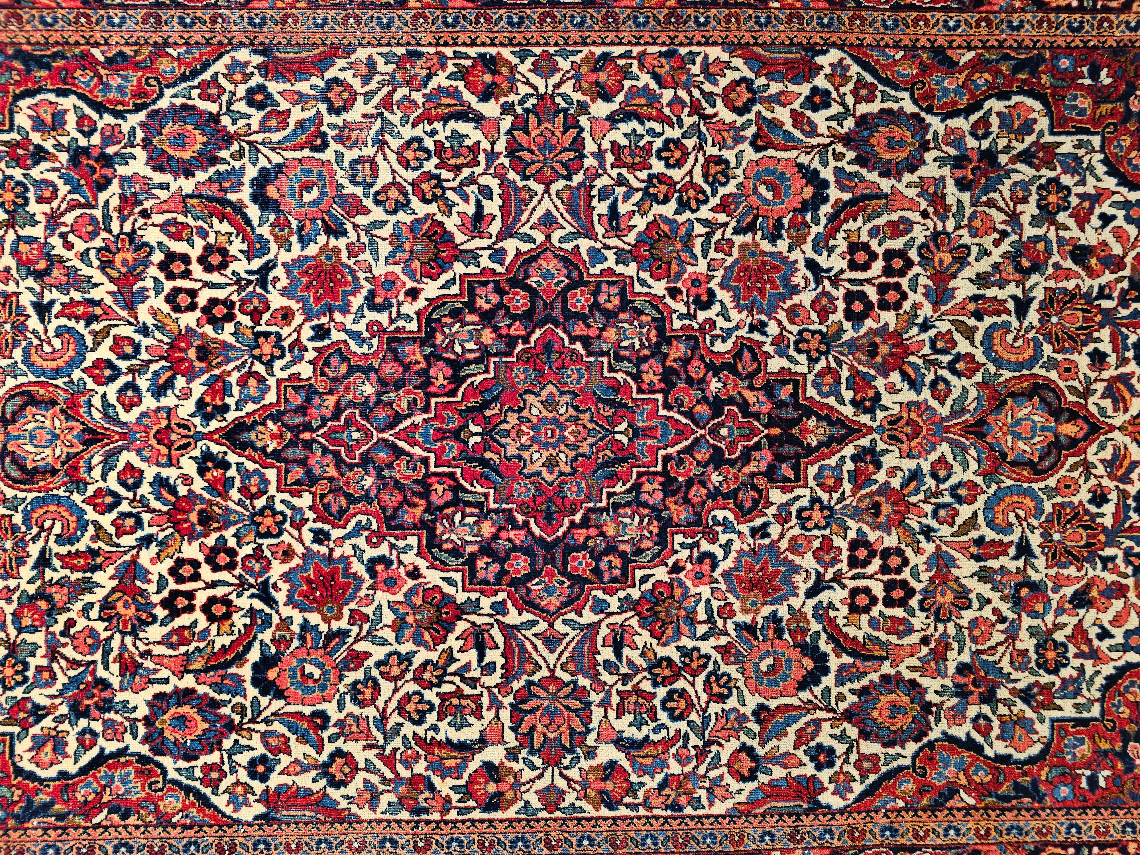 Early 20th Century Persian Kashan in Floral Design in Ivory, Navy Blue, Red In Good Condition For Sale In Barrington, IL