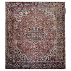 Kashan persiano dei primi del Novecento con motivi floreali in ruggine, avorio, marina, rosa