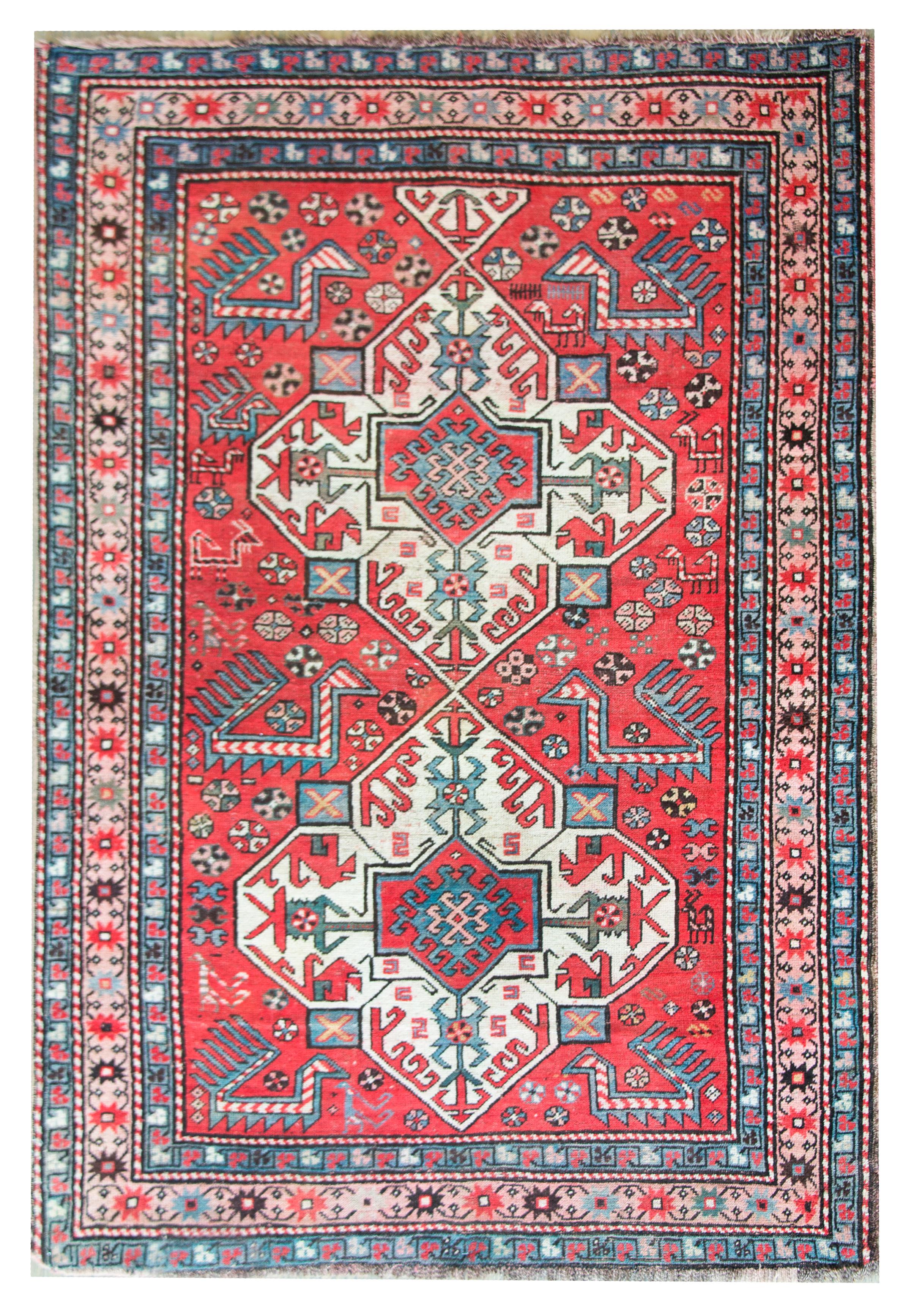 Early 20th Century Persian Kazak Rug For Sale