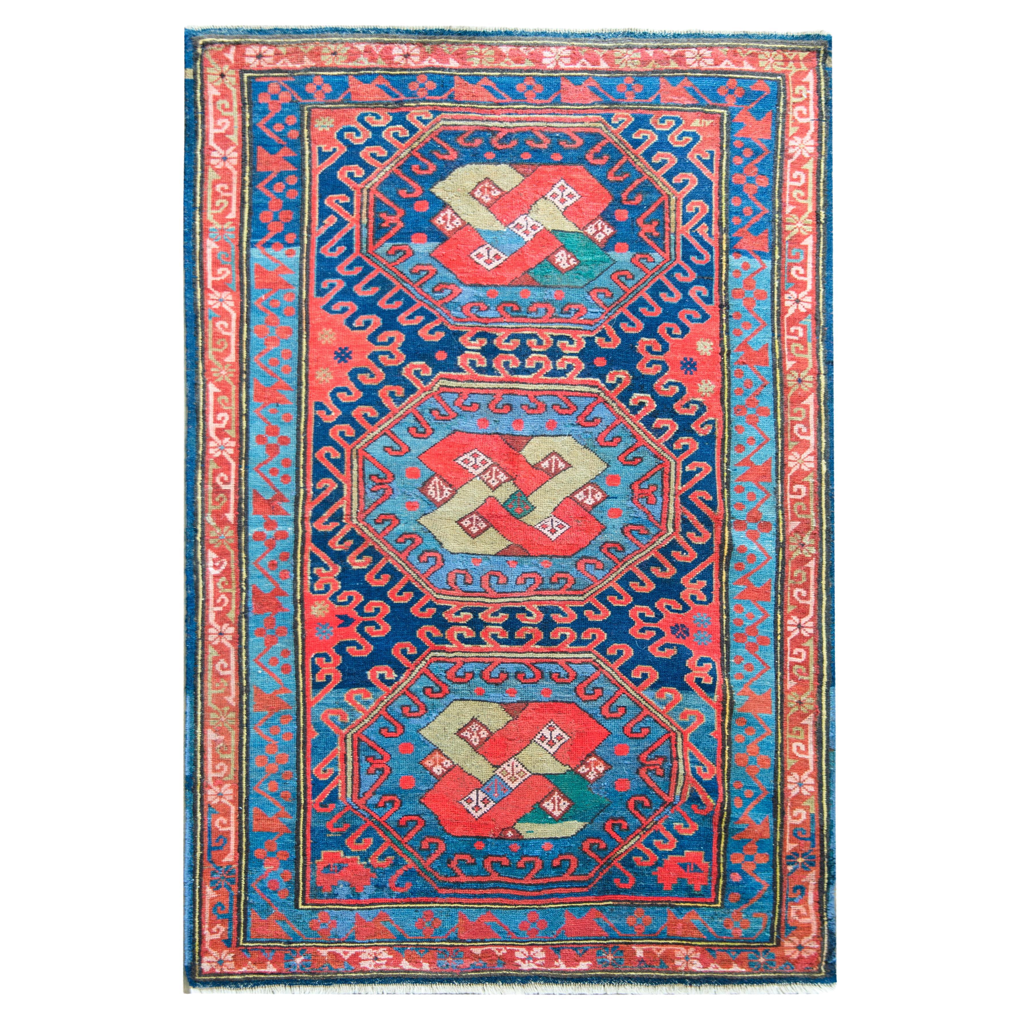 Early 20th Century Persian Kazak Rug For Sale