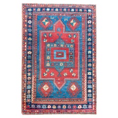 Tapis persan Kazak du début du 20e siècle