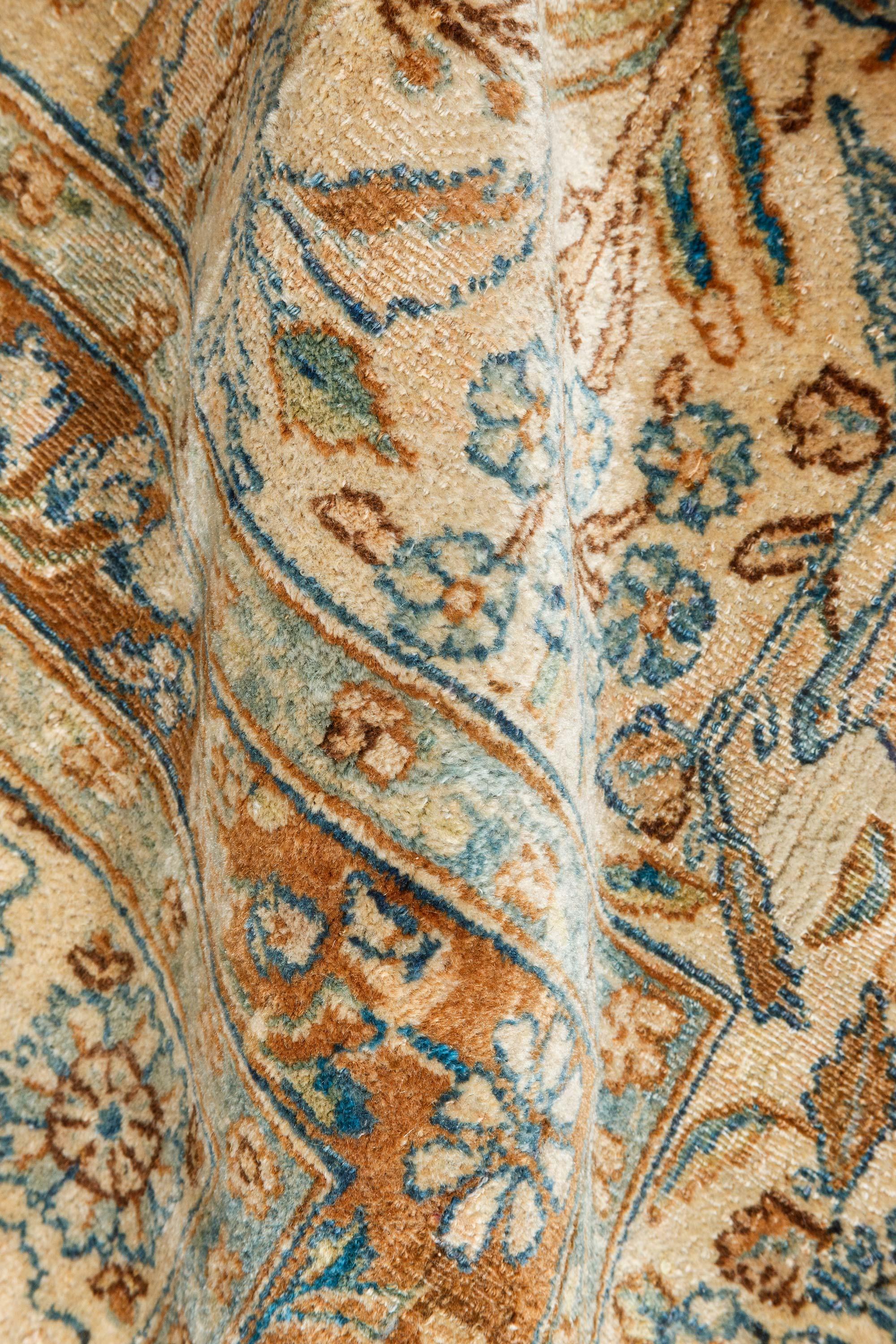Authentic Early 20th century Persian Kirman handmade wool rug
Size: 9'8