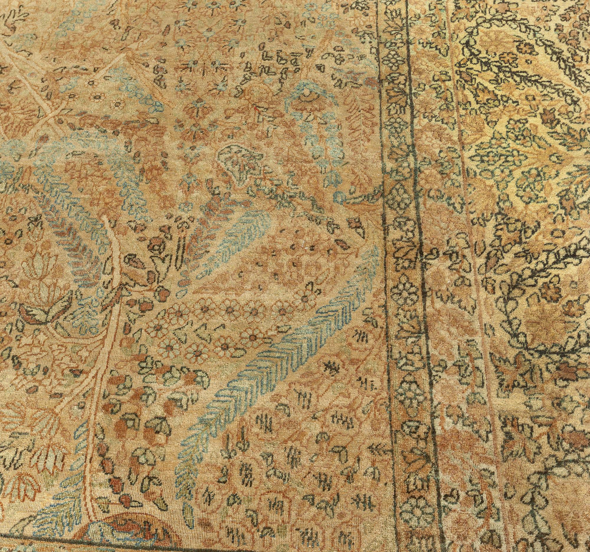 Authentic Early 20th century Persian Kirman botanic carpet
Size: 8'8