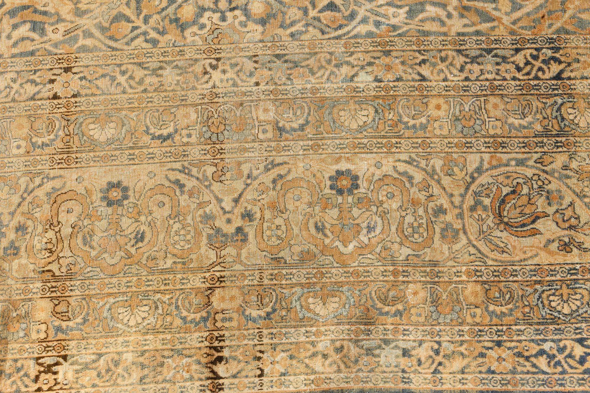 Early 20th century Persian Kirman handmade wool rug
Size: 11'10