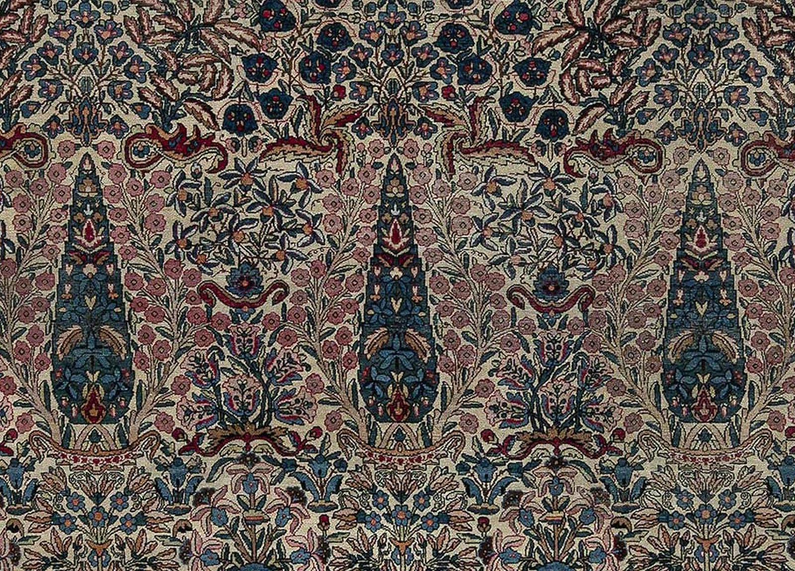 Persischer Kirman-Wollteppich aus dem frühen 20. Jahrhundert in Blau, Braun, Grün, Rosa und Rot
Größe: 10'2