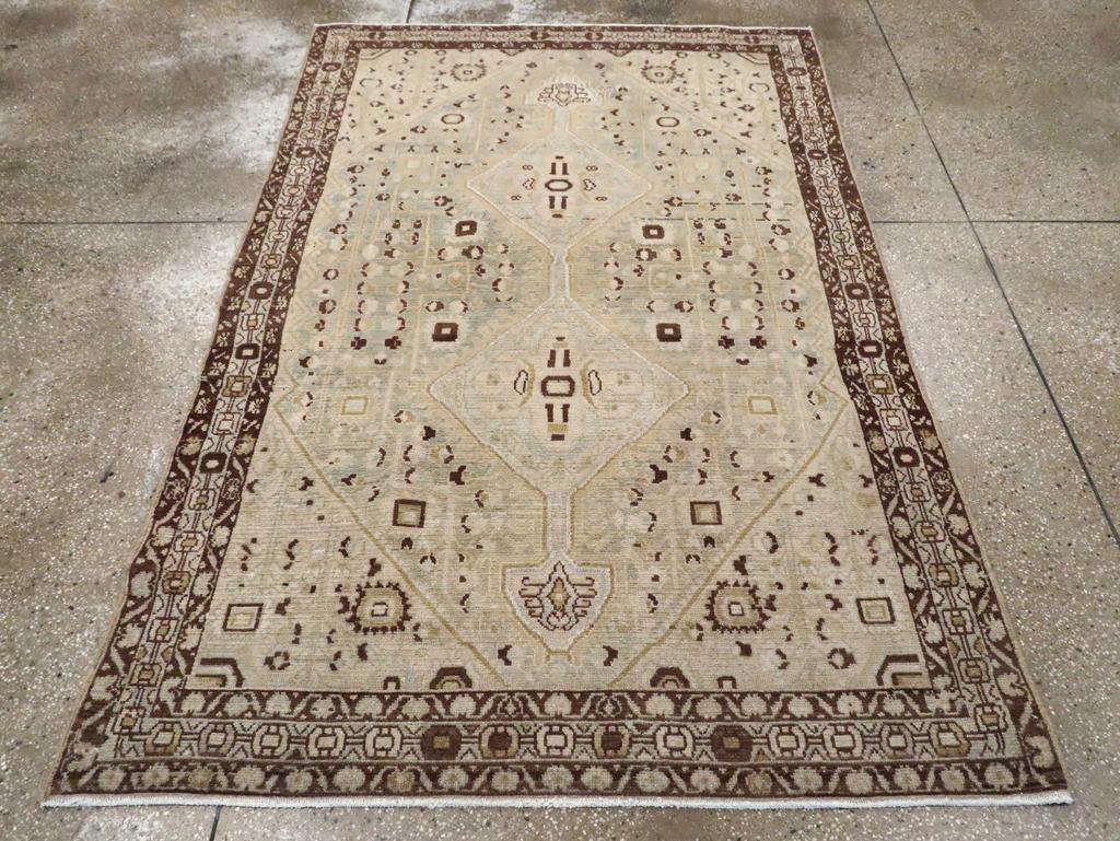 An antique Persian Malayer accent rug handmade during the Early 20th century.

Measures: 4' 10
