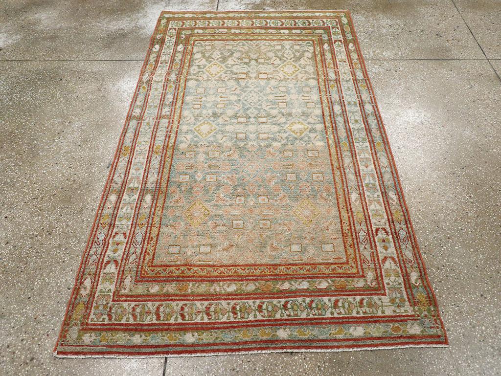 A pair of antique Persian Malayer accent rugs handmade during the Early 20th century.

Measures:
Rug #32890 - 3' 9