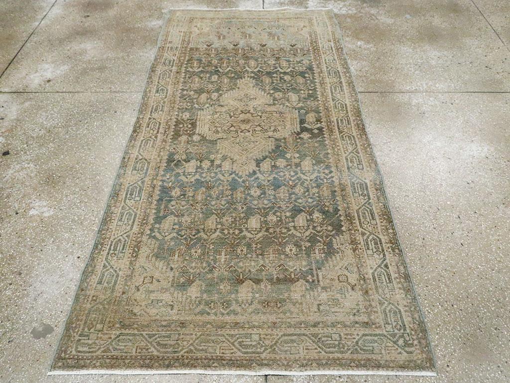 An antique Persian Malayer rug handmade during the Early 20th century.

Measures: 3' 8