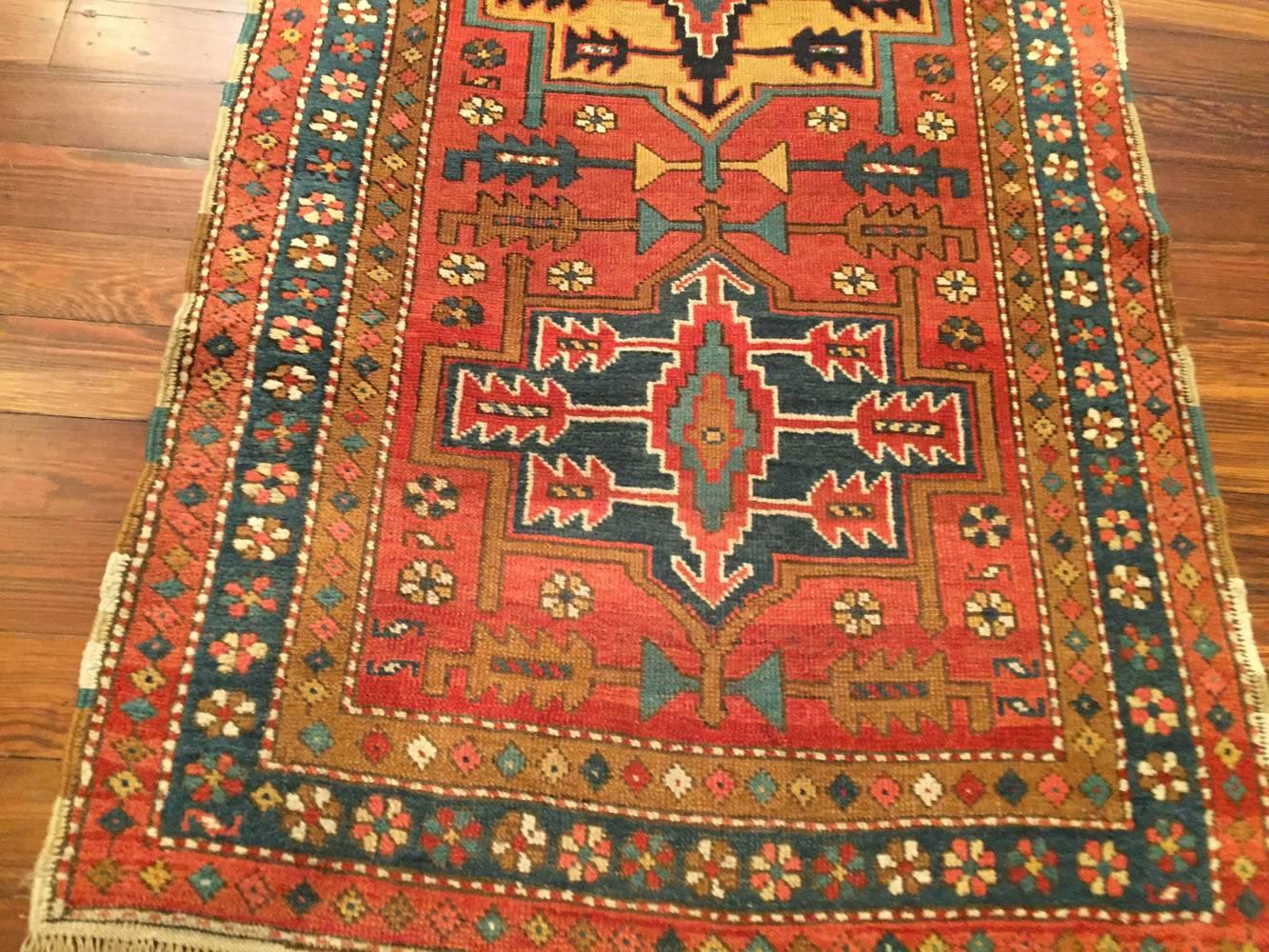 An antique Persian Northwest Persia runner rug, circa 1910.