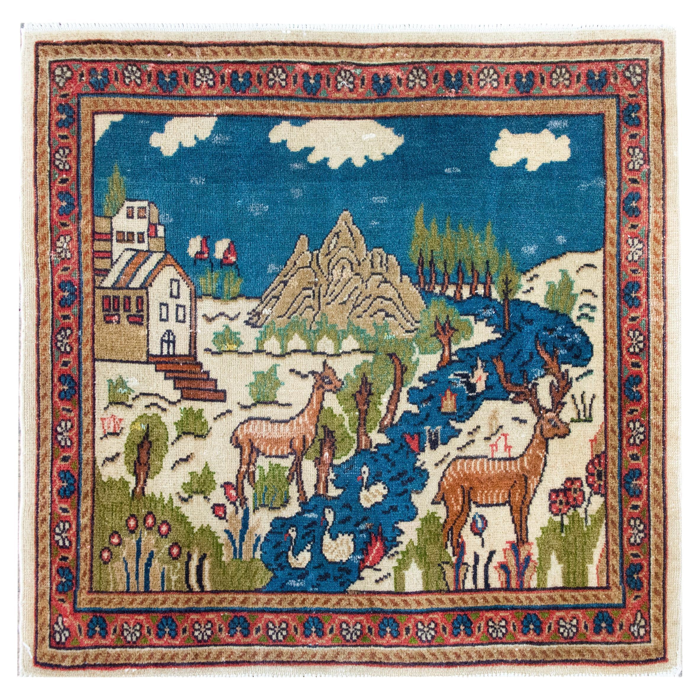 Alfombra persa Tabriz pictórica de principios del siglo XX