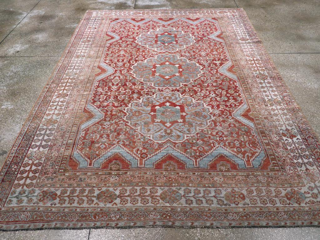 An antique Persian Shiraz accent Carpet handmade during the Early 20th century.

Measures: 7' 0