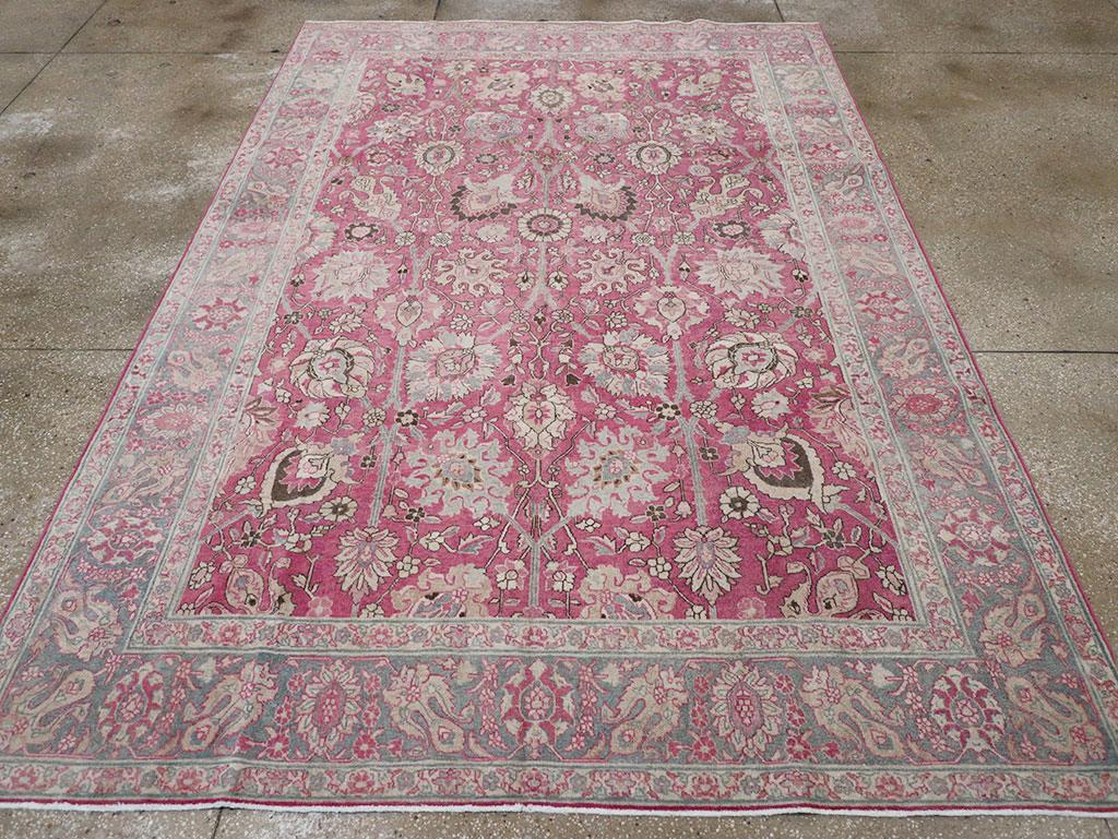 A wool pile of symmetric knots on a wool foundation. A fine example of the traditional, versatile Persian 7’ by 10’ format, here in an urban weave of a boldly drawn “Vase carpet” pattern with a central full-height staff, oblique layered palmettes,