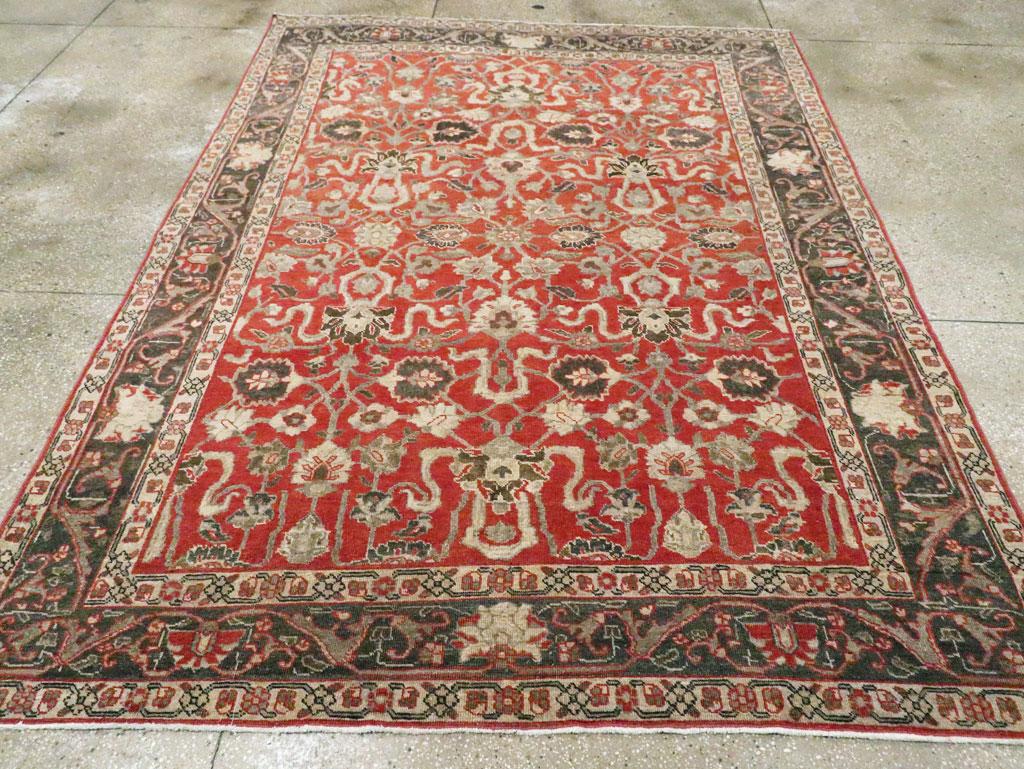 An antique Persian Tabriz accent carpet handmade during the Early 20th century.

Measures: 7' 1