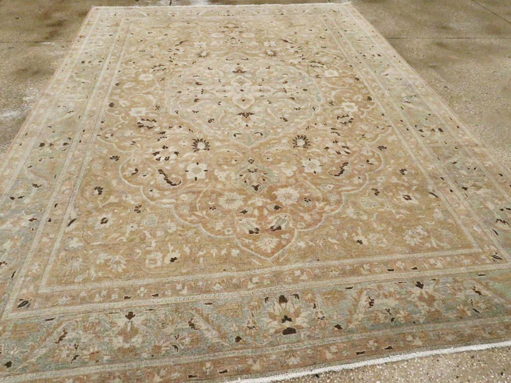 This well-woven NW Persian city carpet shows the classic “book cover” medallion and corners layout, but filled with striped palmettes, ragged palmettes, lancet leaves, and other necessary flora. General brown field with rust undertones. The main
