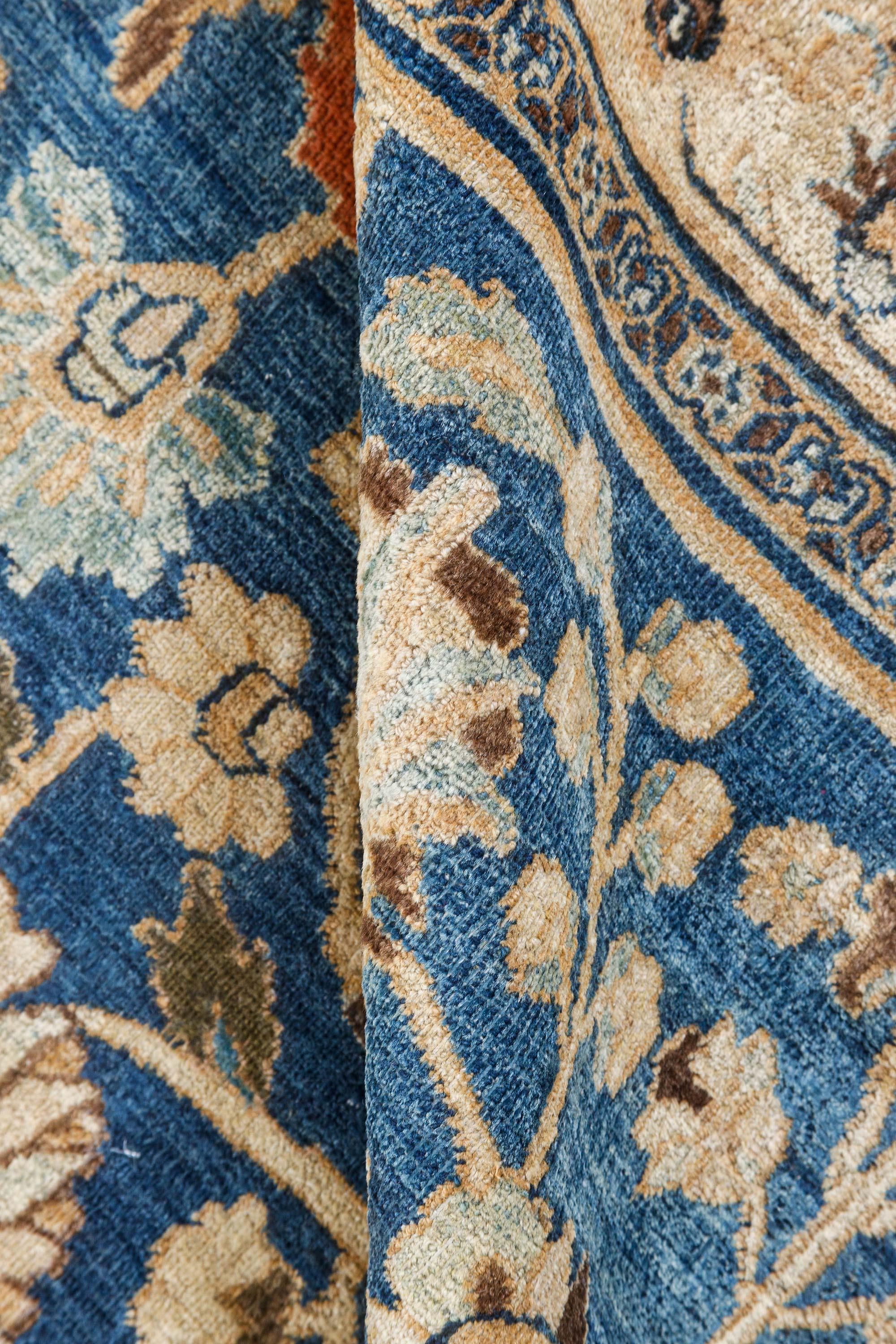 Early 20th century Persian Tabriz blue brown handmade wool carpet.
Size: 12'0
