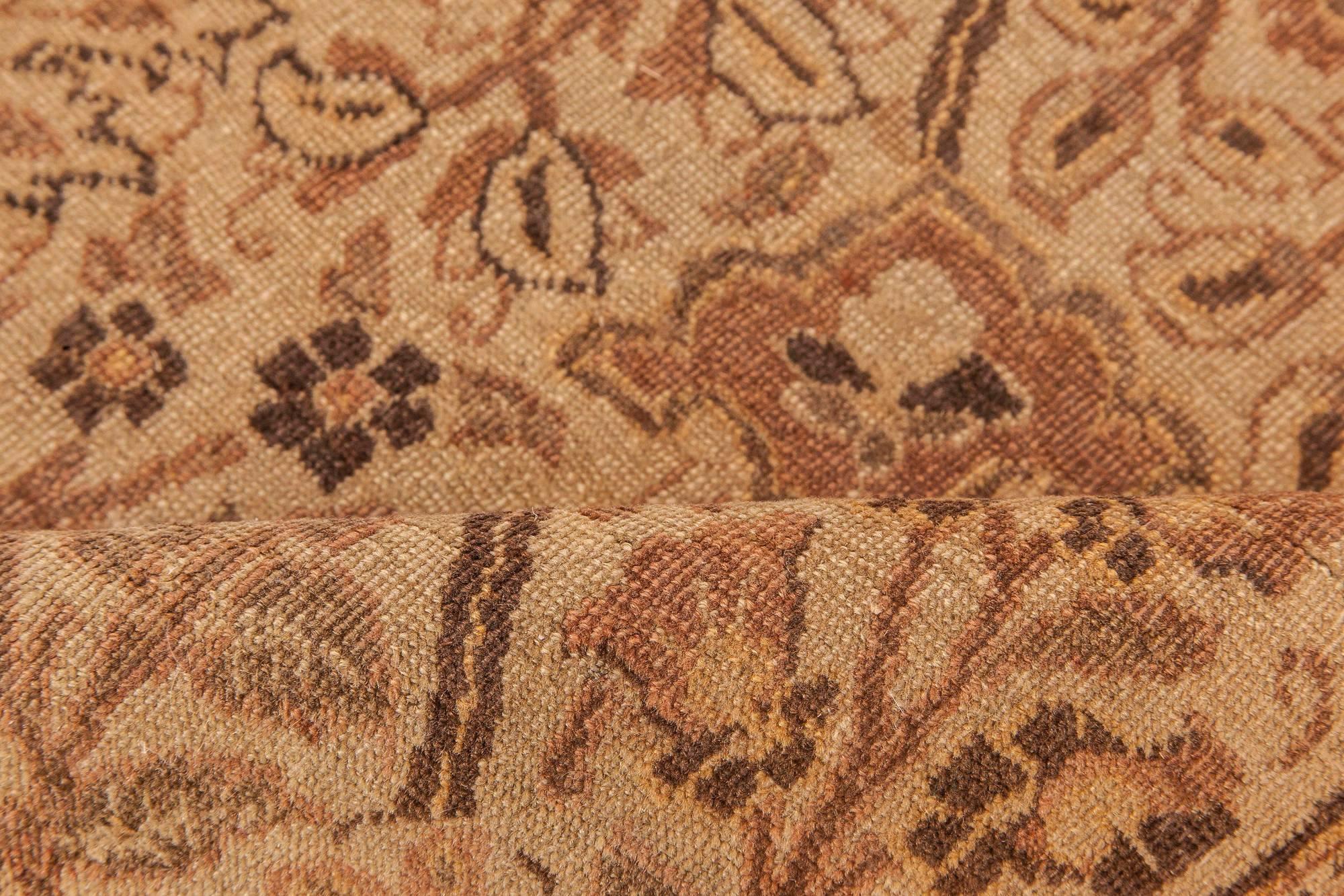 Early 20th century Persian Tabriz floral beige, sepia and brown handmade wool rug
Size: 8'10