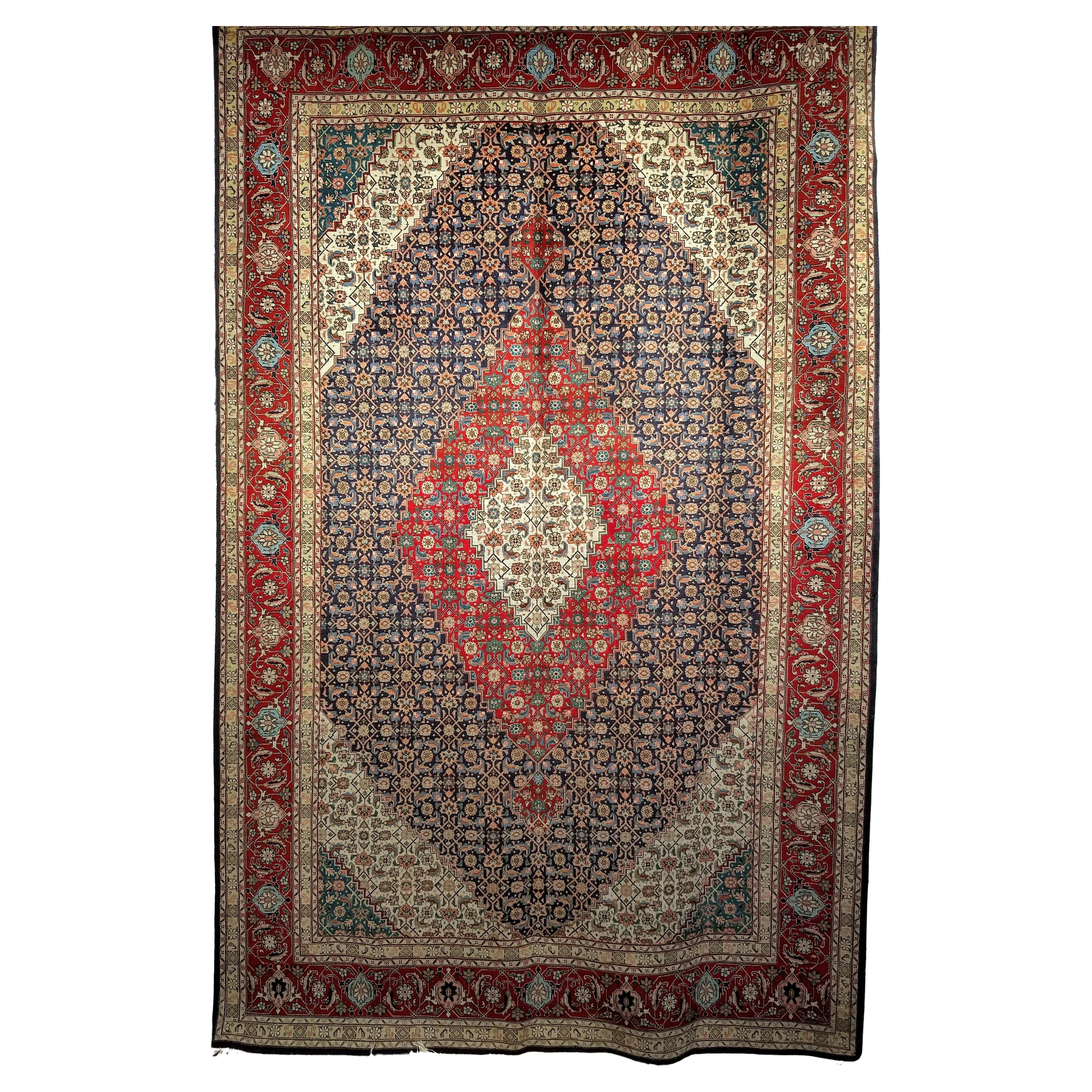 Alfombra persa Tabriz Mahi de principios del siglo XX con motivos geométricos