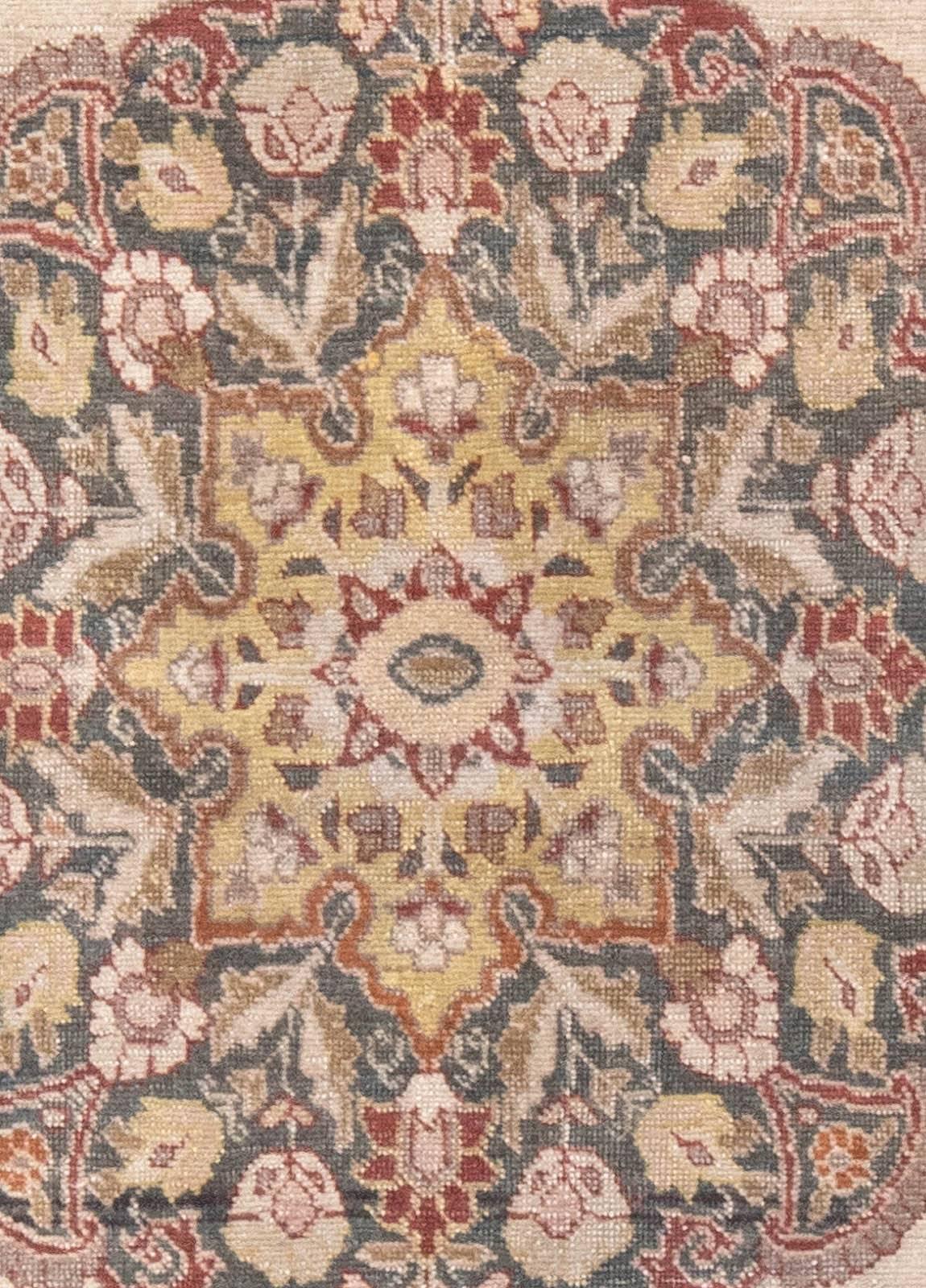 Early 20th century Persian Tabriz handwoven wool rug
Size: 4'0