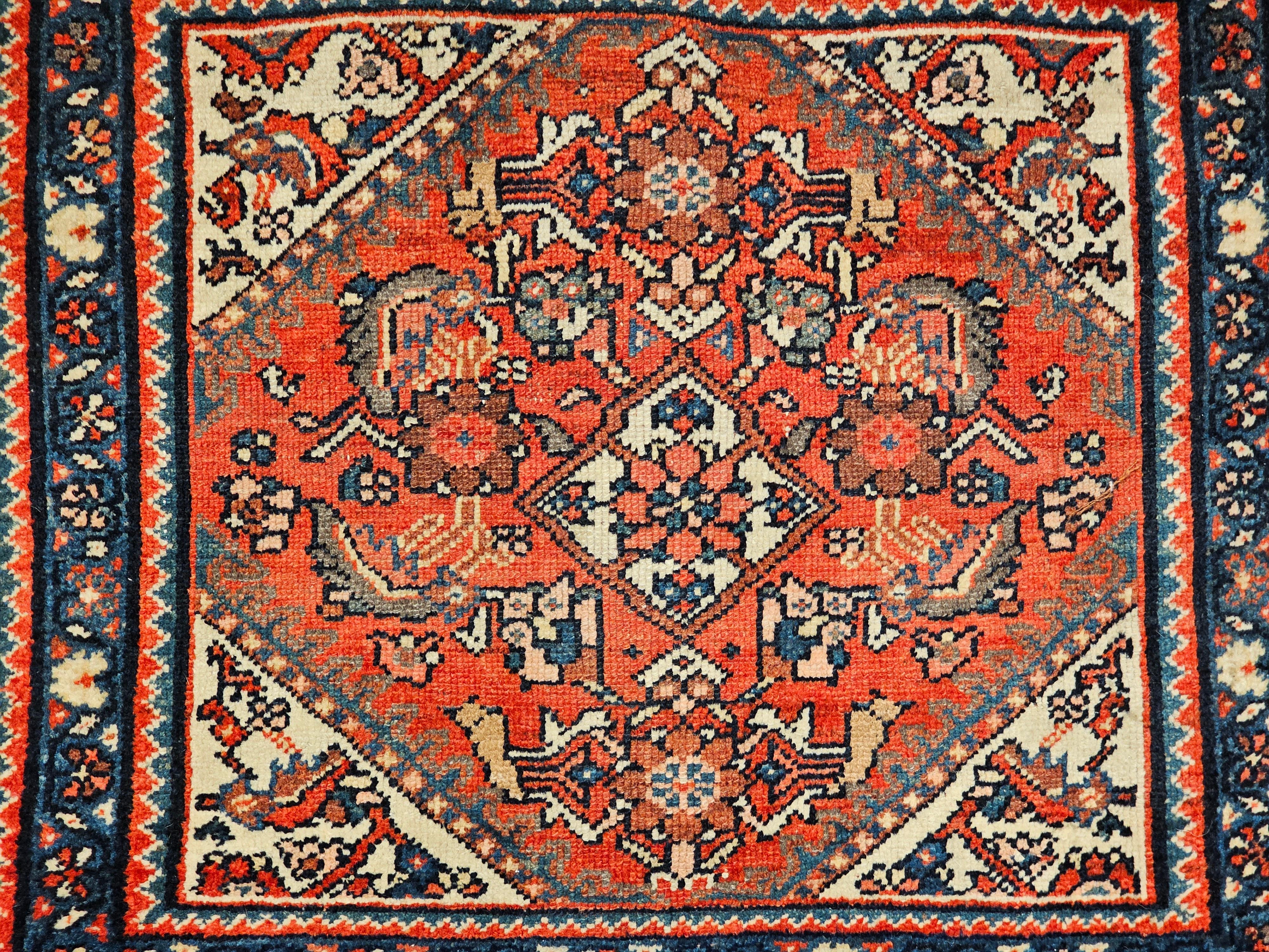 Early 20th century Persian Malayer Tribal Bagface Used as Nomadic Wall Art. The Malayer bag face from NW Persia was woven by the tribes in the late 1800s. It could have been either the face of a saddlebag or the side panels for a mafrash (large