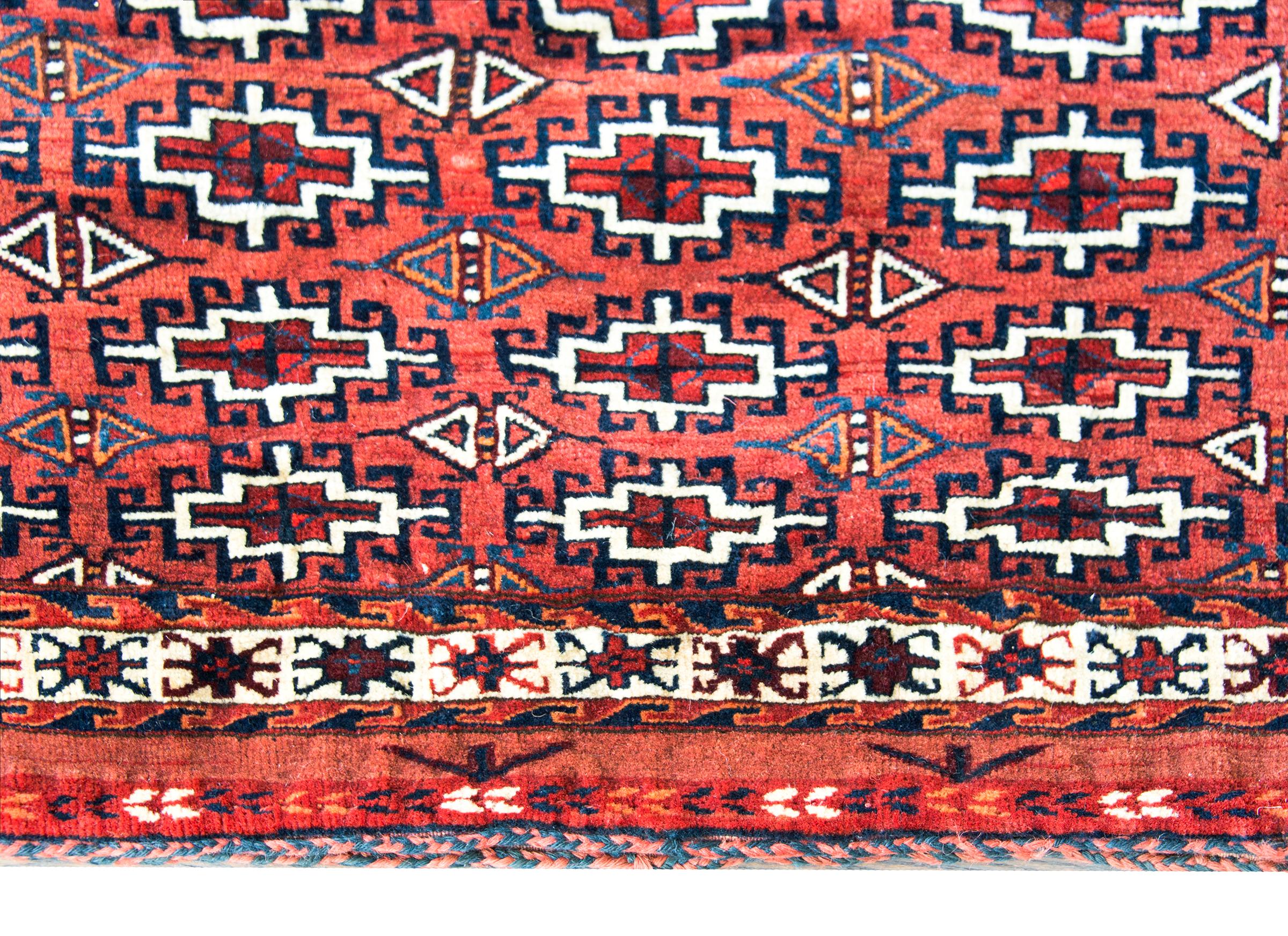 Hand-Knotted Early 20th Century Persian Yamut Bag Face Rug For Sale