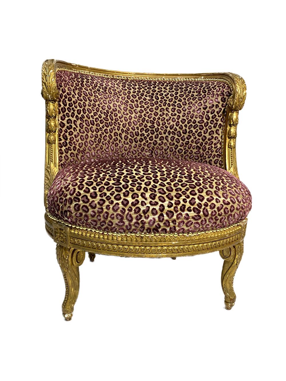 Early 20th century petite antique carved Louis XV style giltwood boudoir chair reupholstered in designer Wilde Safari purple and lavender cut velvet cheetah fabric by Colefax and Fowler framed in an authentic 100 year old distressed giltwood frame