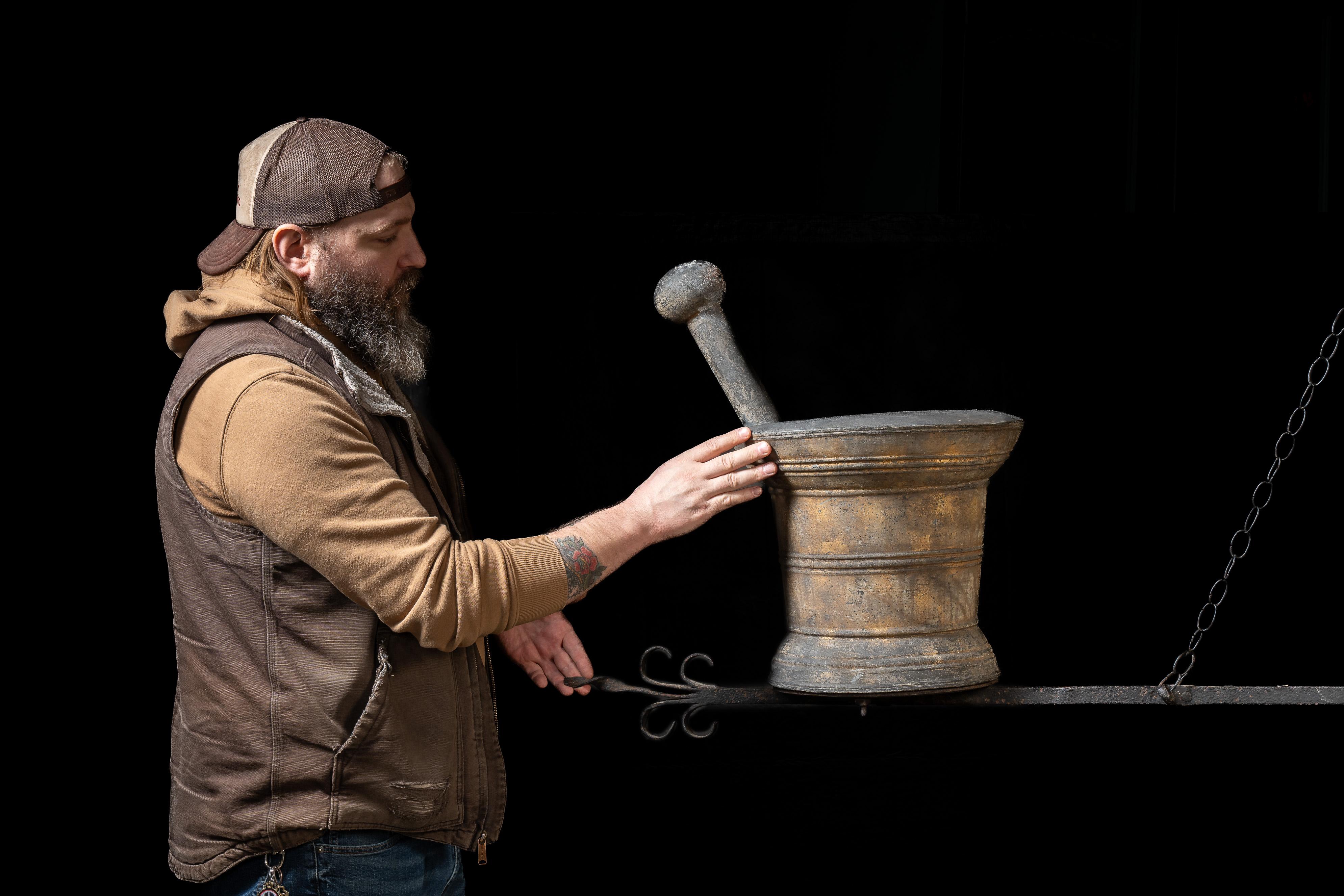Antique figural copper and tin trade sign.

This piece takes the form of an antique mortar and pestle, one of the most important tools used by practitioners of medicine for centuries. This tool was used in the production of foods, spices, herbs, and