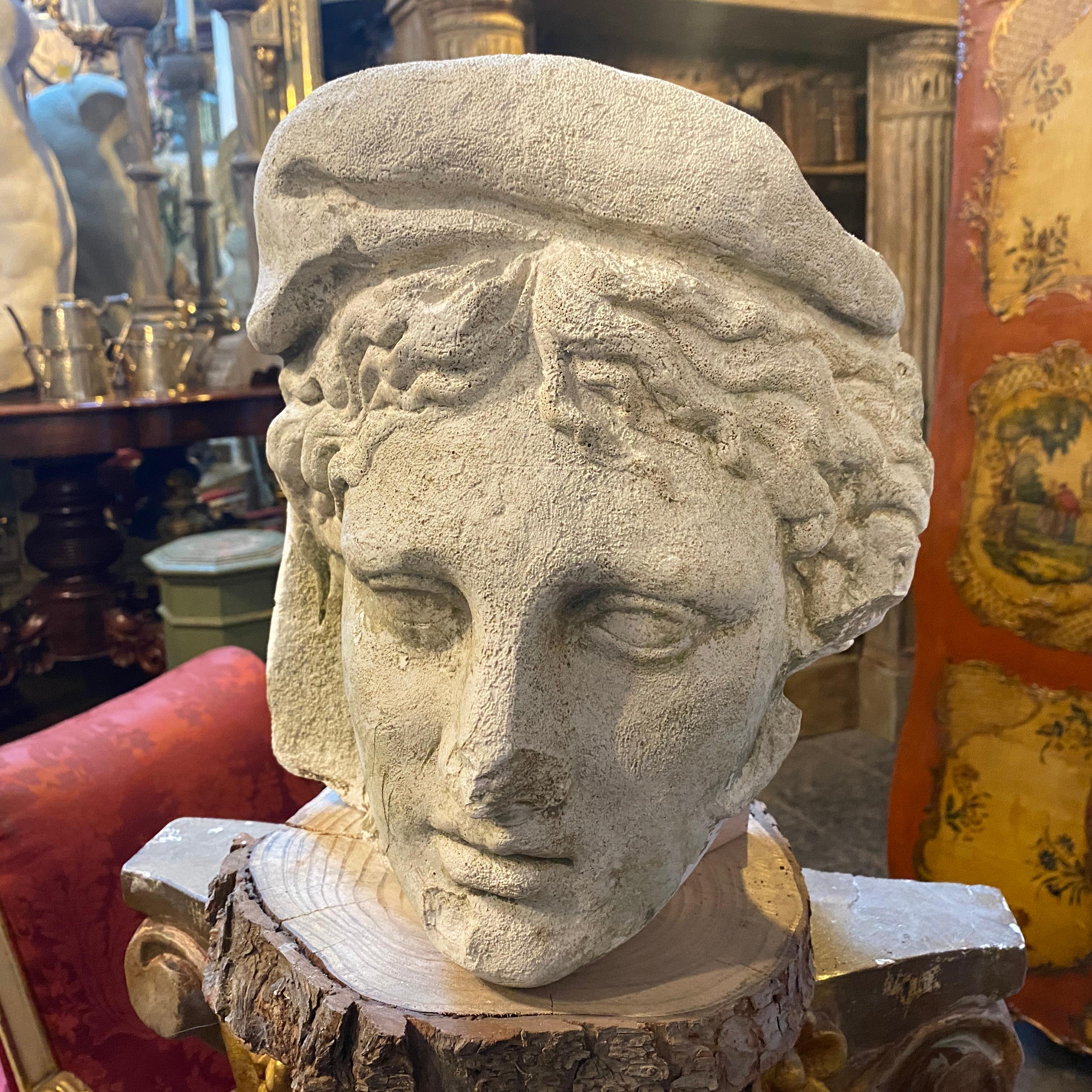 A plaster cast hand-crafted in an italian school of art in the early 20th century, original conditions. It depicts a roman head.