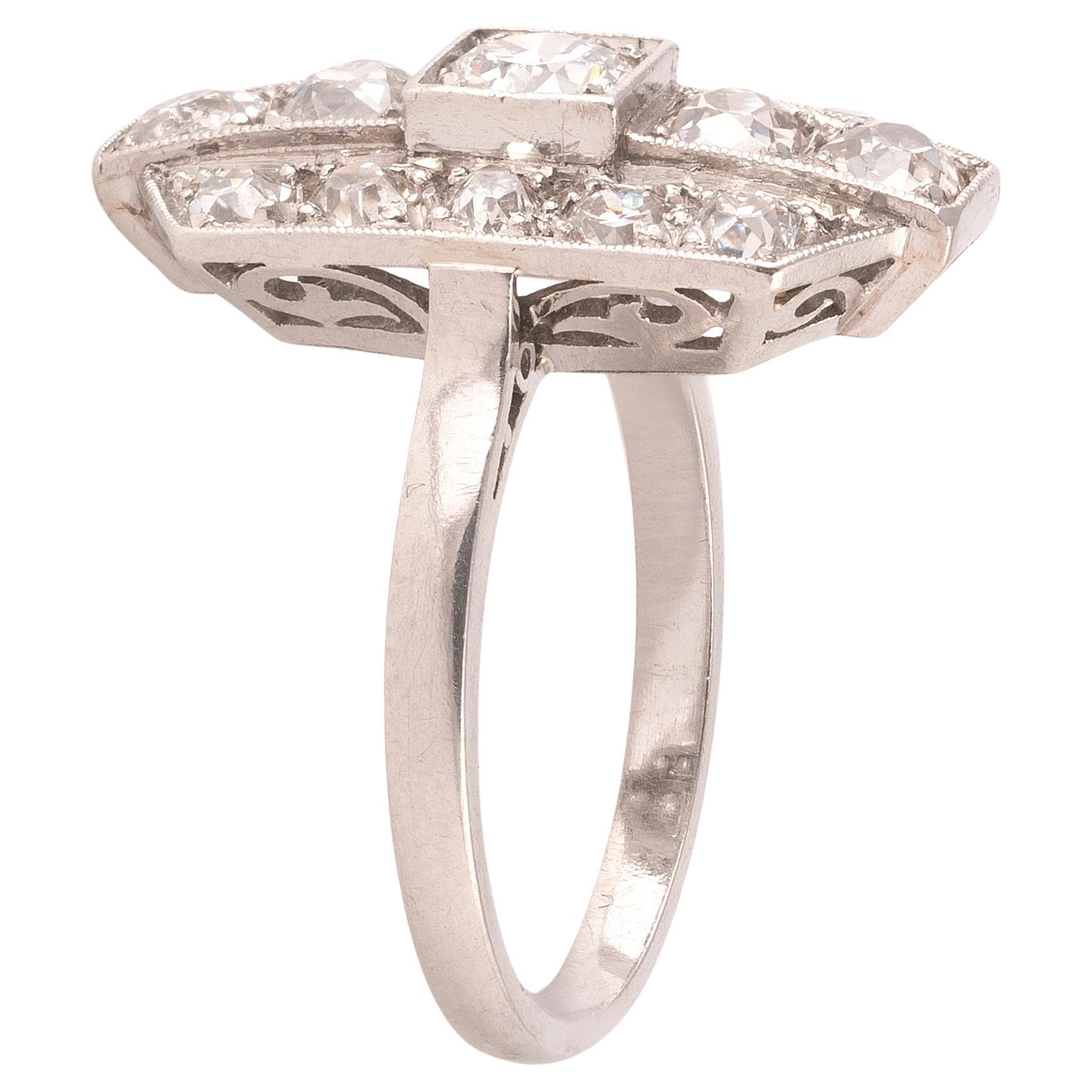 Rectangular shape old cut diamonds approximately 1.5ct, millegrain set in platinum, lozenge pierced to gallery.
Cluster head 2.2cm x 1.2cm 
Size:6 1/2
Weight: 6.51gr.

