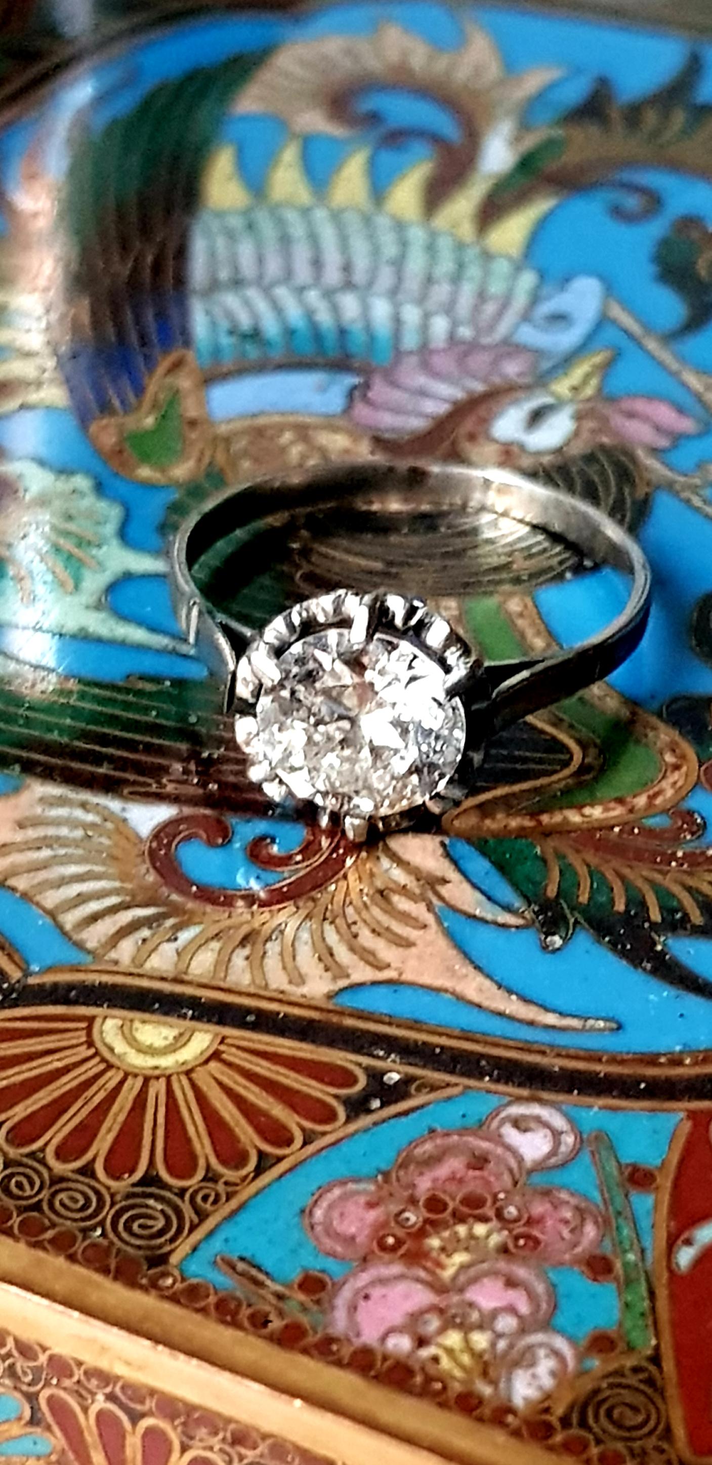 Early 20th Century Platinum, Solitaire Old European Cut  1.63 ct Diamond Ring,
An old ring made of platinum.
The main decorative element is an impressive 