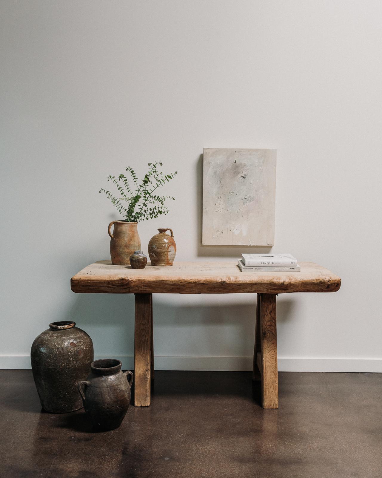 Primitive console table from Spa, Belgium with metal inlay detail. 
