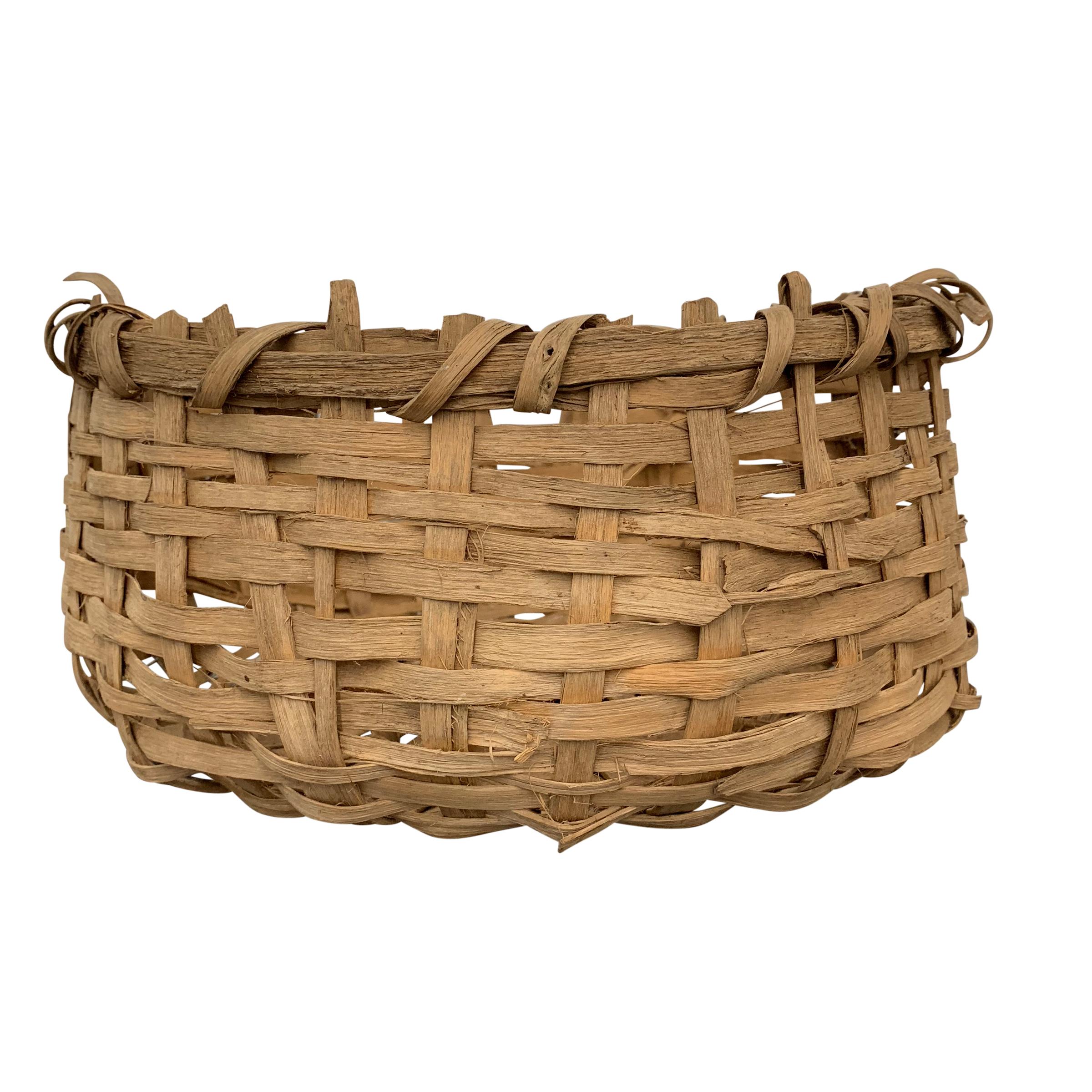An early 20th century Bulgarian Primitive splint basket, not tightly woven, and not super refined, but a fantastic shape and equally fascinating structure.