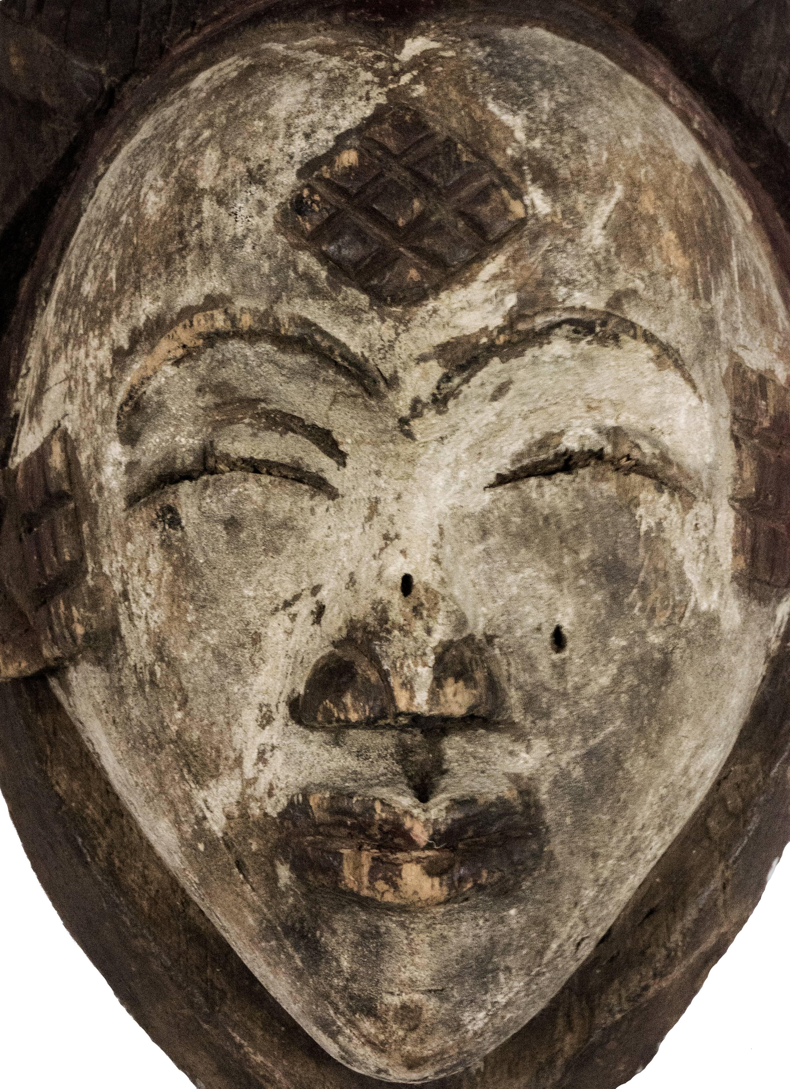 Tribal Early 20th Century Punu Mask from Gabon For Sale
