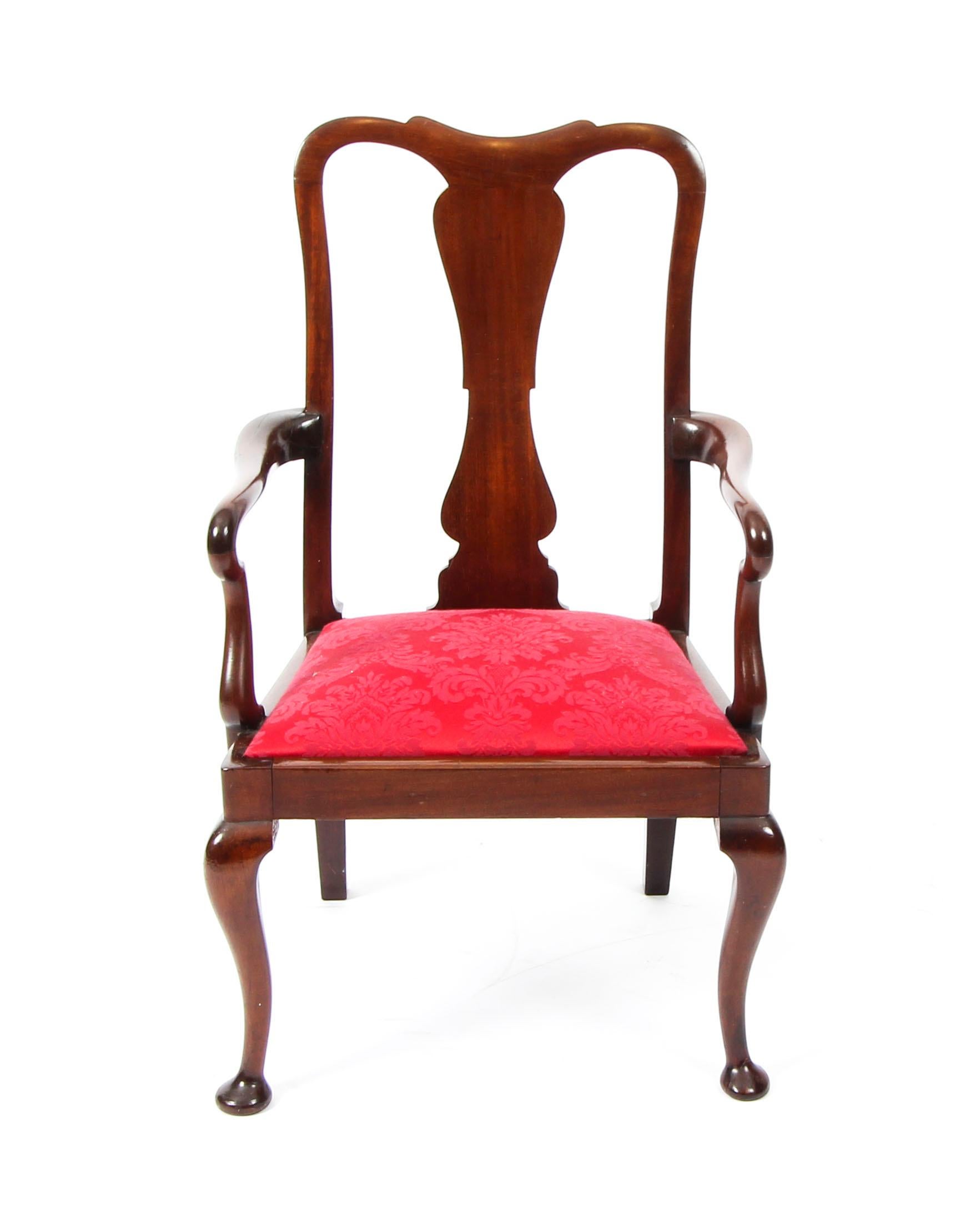 This is a beautiful antique Queen Anne revival child's chair, circa 1920 in date.

This chair has been masterfully crafted in beautiful solid mahogany and upholstered in a striking burgundy damask.

THE BOTANICAL NAME FOR THE MAHOGANY THIS ITEM IS