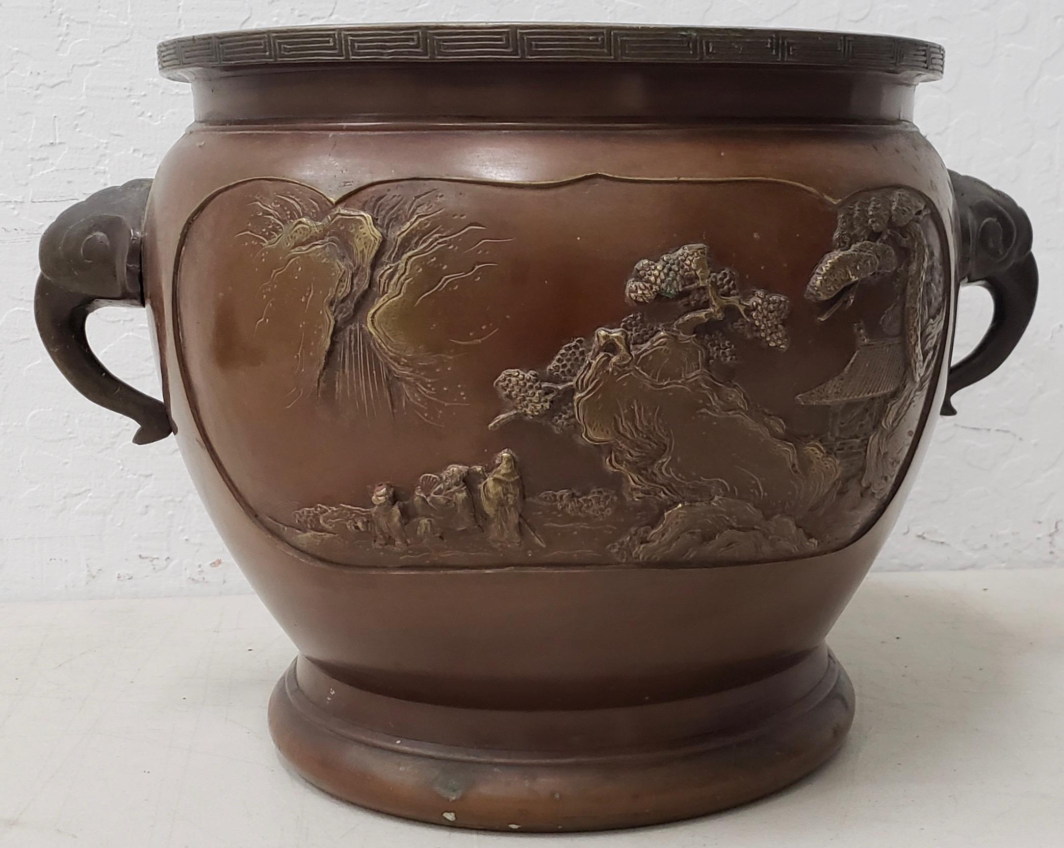 Early 20th century raised relief Chinese bronze planter

Fantastic bronze planter. Great for your orchids or other large potted plants.

Dimensions 12