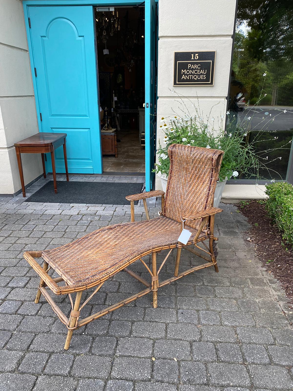 Early 20th century rattan and bamboo folding chaise lounge with adjustable back
Seat measures 20
