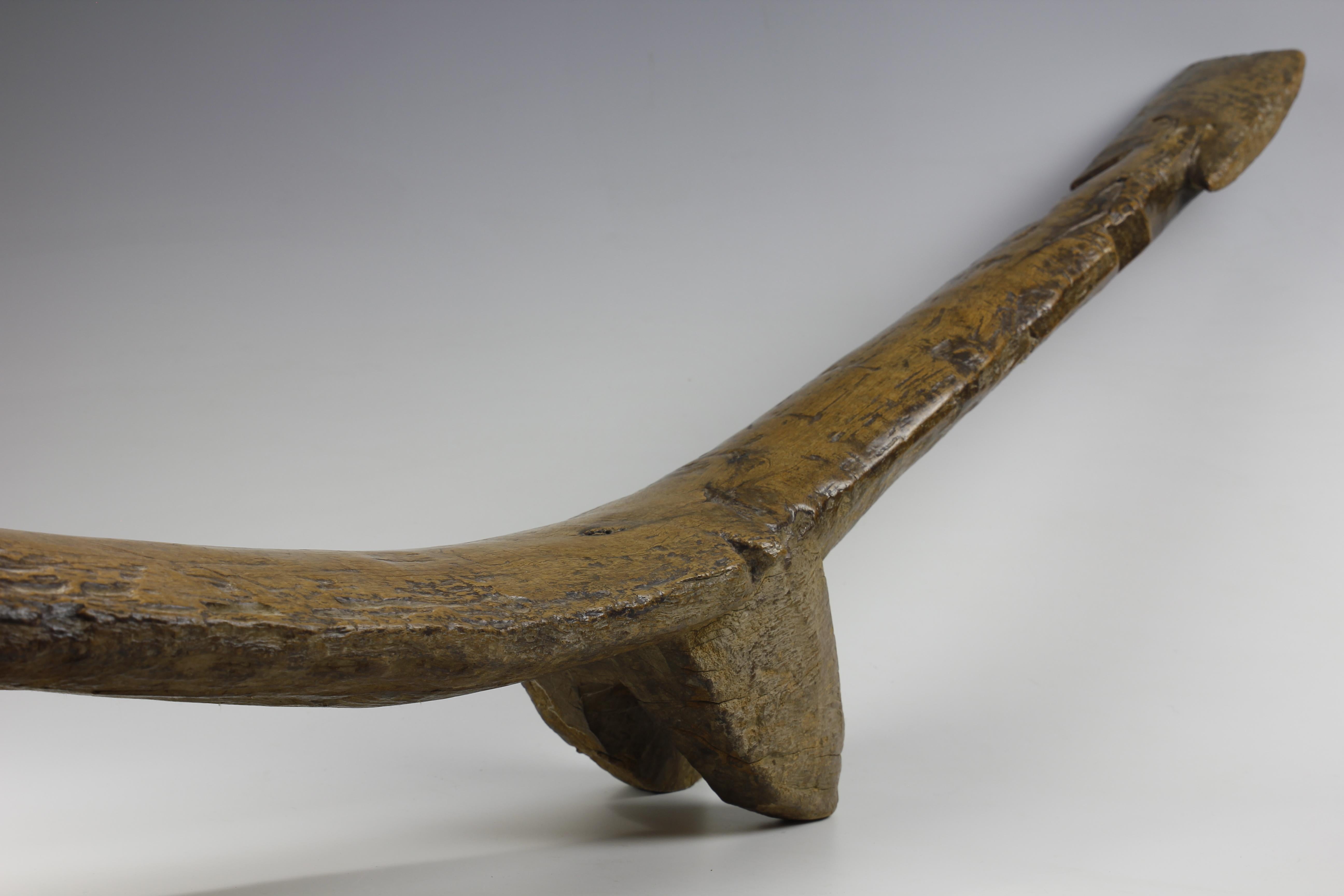 Carved Early 20th Century Reclining Lobi Backrest With Two Legs For Sale