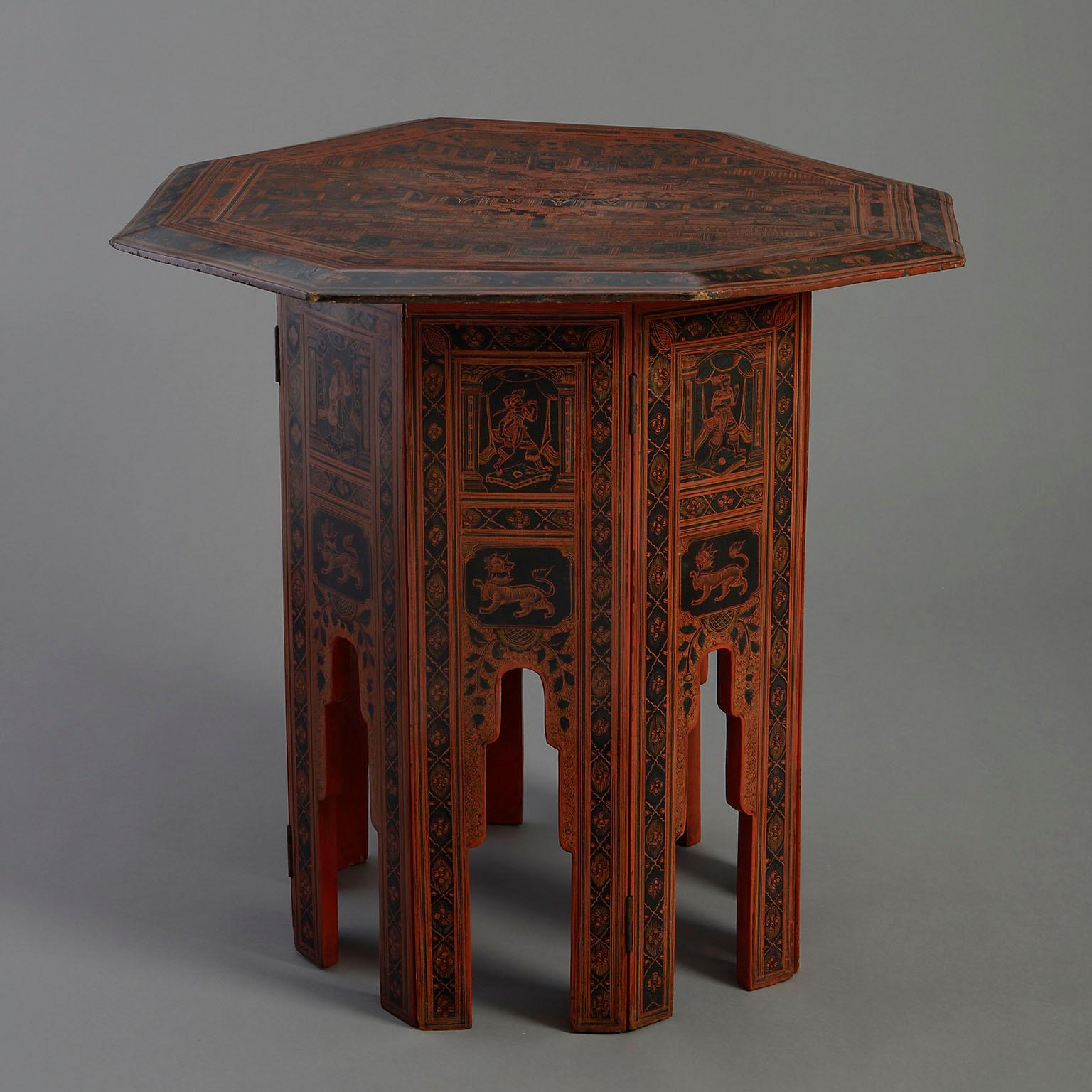 An early twentieth century red lacquer low occasional table, the top of octagonal form and decorated throughout with court scenes, the base of arched panels.

Circa 1900 Oriental

Dimensions: 29 W x 29 D x 27 H inches
74 W x 74 D x 69 H cm