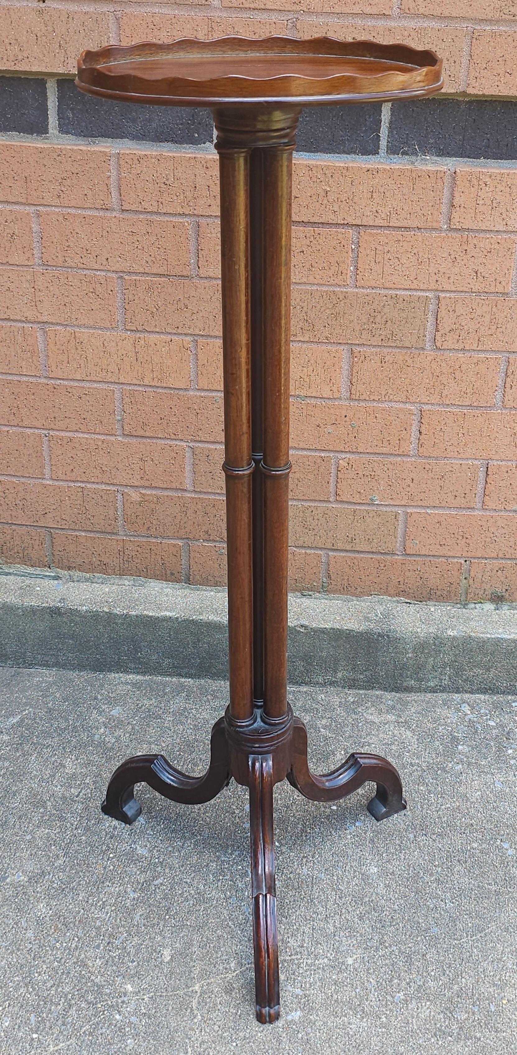 Regency Style Tripod Mahogany Pedestal Plant Stand with Scalloped Gallery oval top.
Measure 14