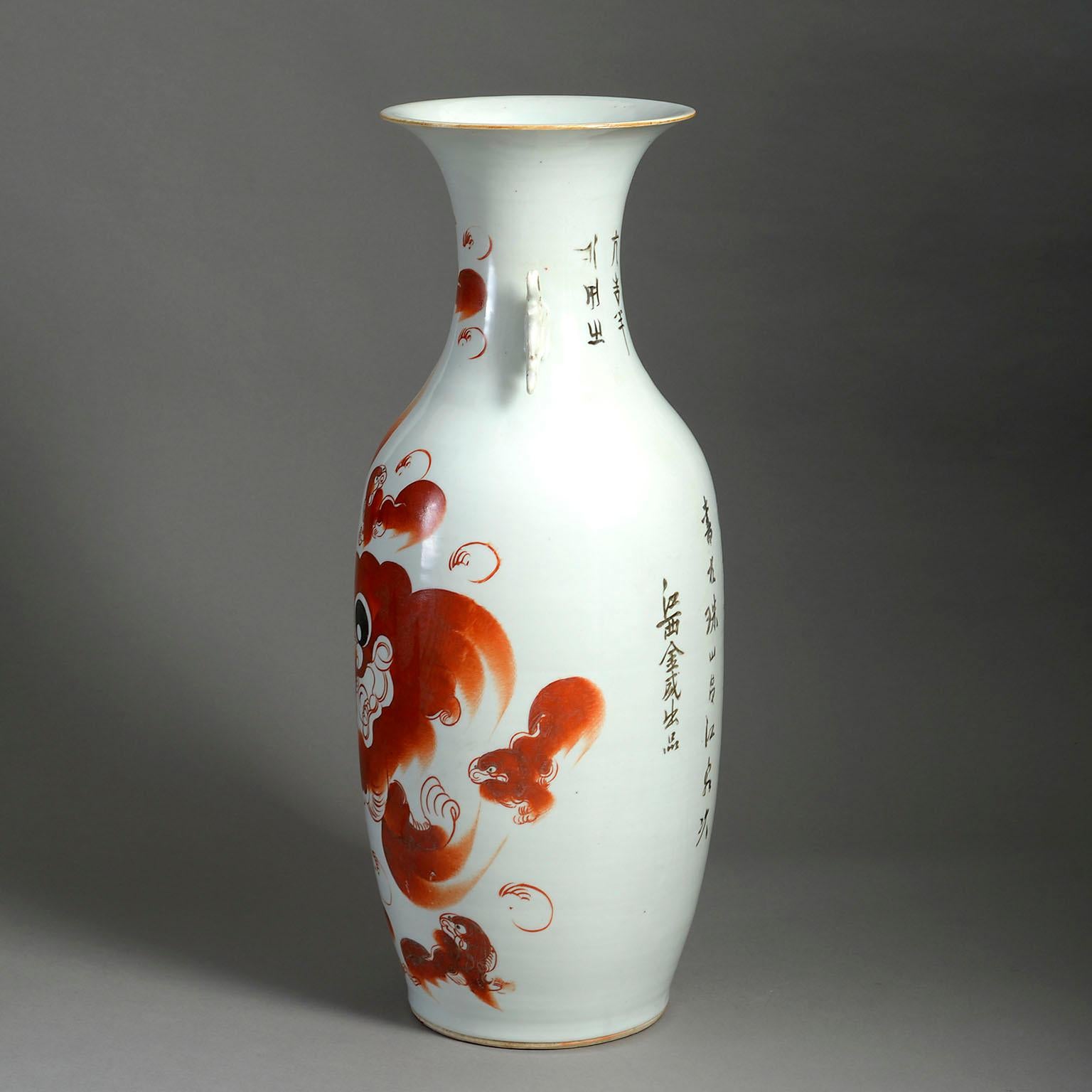 A twentieth century Republic Period porcelain foo dog vase of good scale, decorated with bright red glazes upon a white ground, with character marks verso.

Circa 1920 China

Dimensions: 9 W x 9 D x 23 H inches
23 W x 23 D x 58.5 H cm.