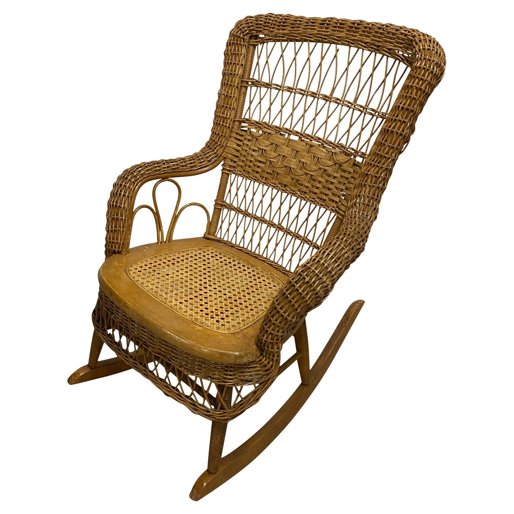 Early 20th Century Rocking Chair with Caned Seat For Sale