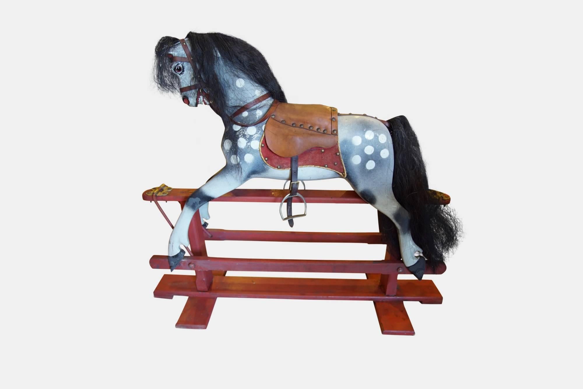 An early 20th century rocking horse in original condition.

circa 1920.
  