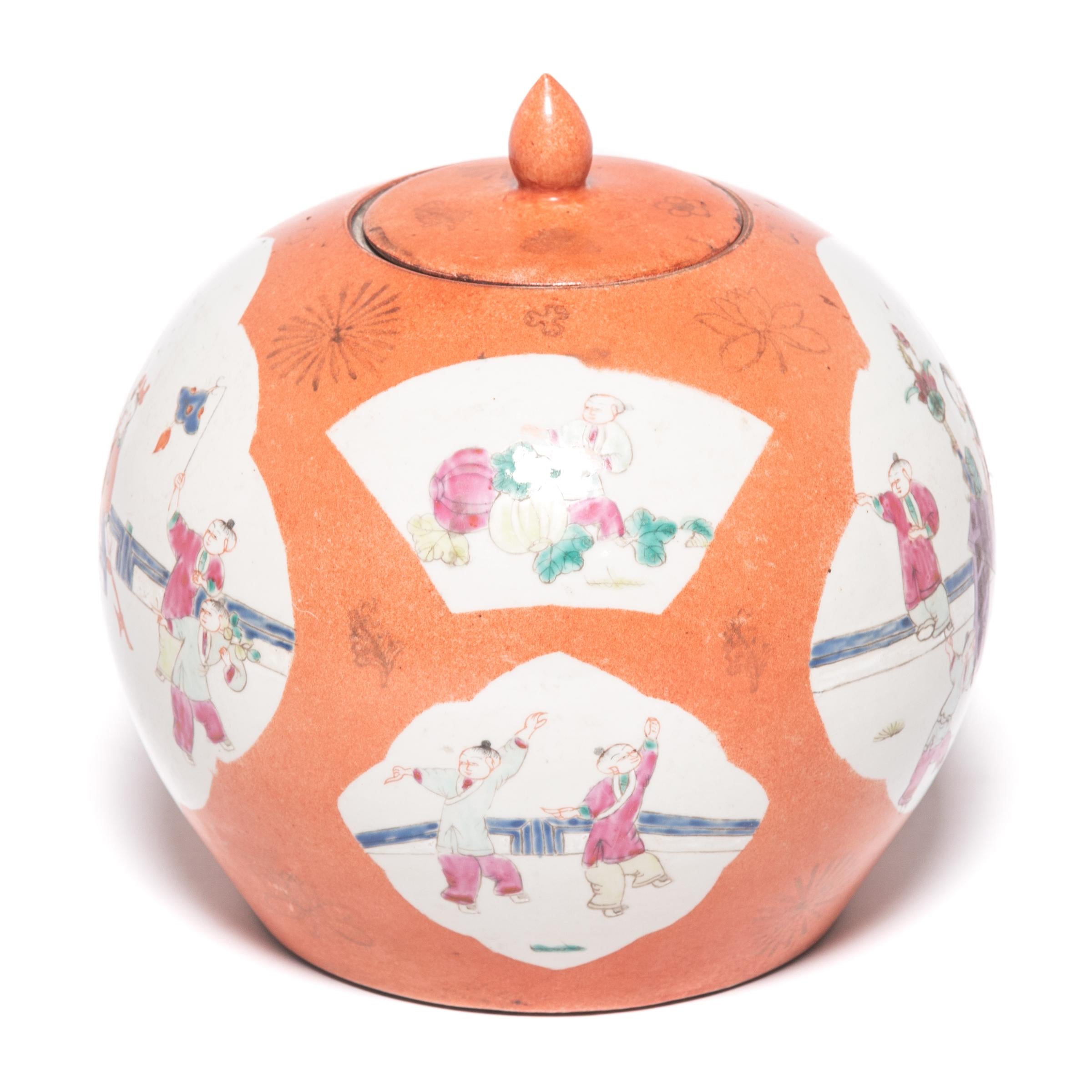 White cartouches open on this vibrant vase’s persimmon orange field like parting clouds, revealing scenes of young boys practicing martial arts. Perhaps commissioned for newlyweds, the multitude of children on this early 20th-century vase symbolize