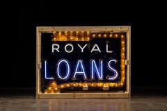 Señal de neón de porcelana de una cara de Préstamos Reales de principios del siglo XX