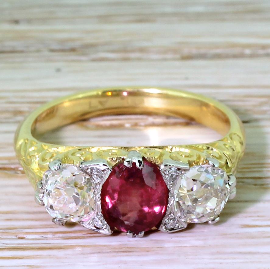So beautiful. The natural and unheated ruby in the centre is bright and internally clean, giving it an almost hypnotic glow. The two diamonds either side (of a combined weight of 1.38 carat) are white and full of sparkle; worthy companions to the