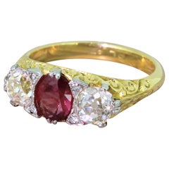 Antique Early 20th Century Ruby and Old Cut Diamond 18 Karat Gold Trilogy Ring