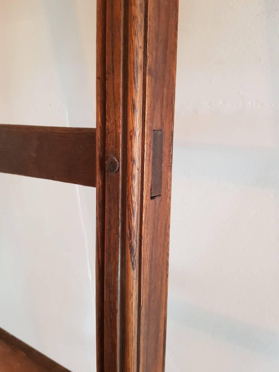 Beautiful patina on these two Old rural pinned wooden ladders from the early 20th century.

The measurements are,
Depth 6 cm/ 2.3 inch.
Width 33 cm/ 12.9 inch.
Height 219 cm/ 86.2 inch.
 