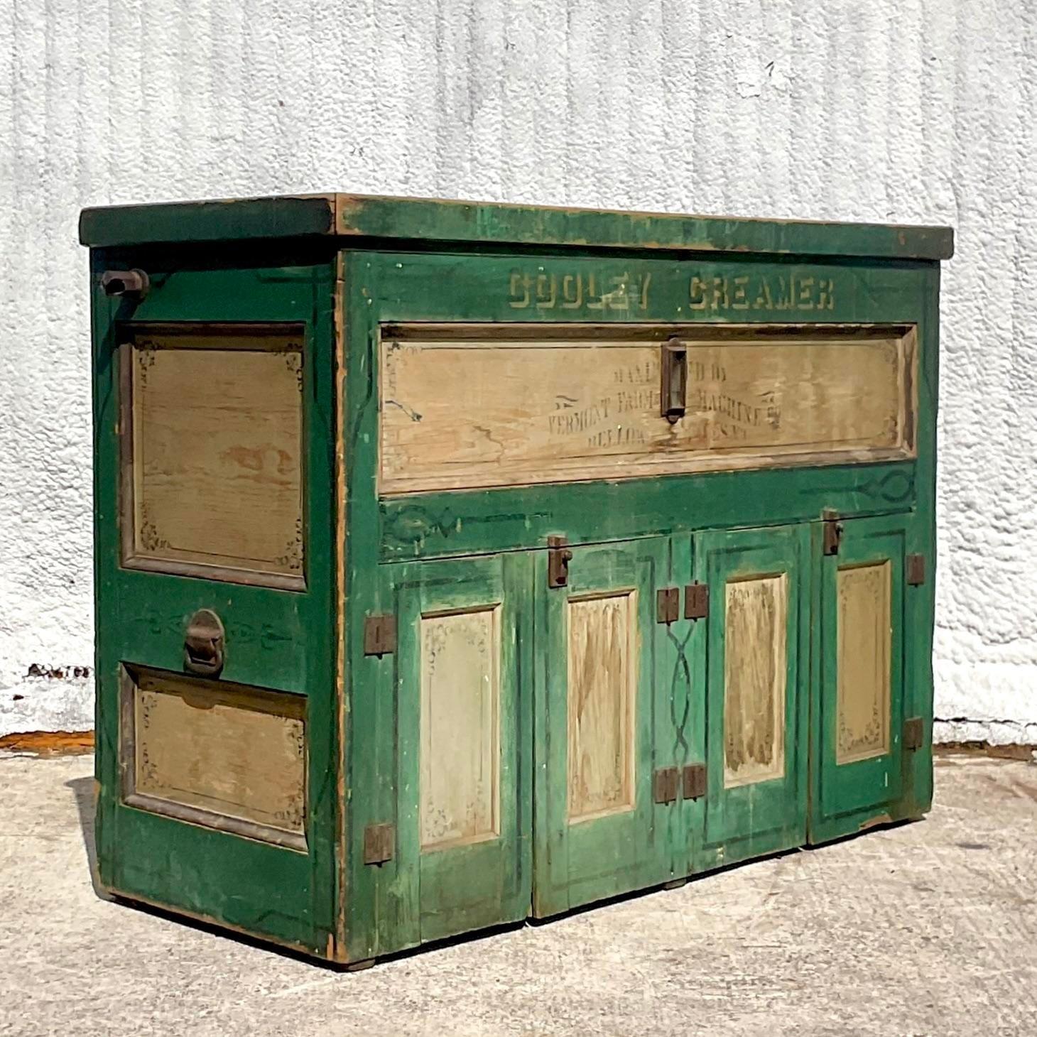 An extraordinary vintage Boho creamery cabinet. A real beauty from the iconic Philadelphia A.H.Reid creamery. Years of weathered patina with all the original tags still intact. Formerly a cooler, but would be a great storage unit today. Perfect as a