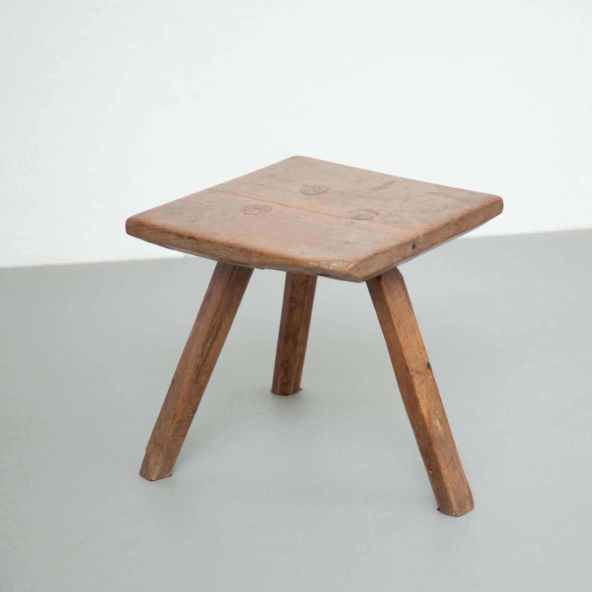 Rustic French stool.
By unknown manufacturer from France, circa 1930.

In original condition, with minor wear consistent with age and use, preserving a beautiful patina.

Material:
Wood.

  